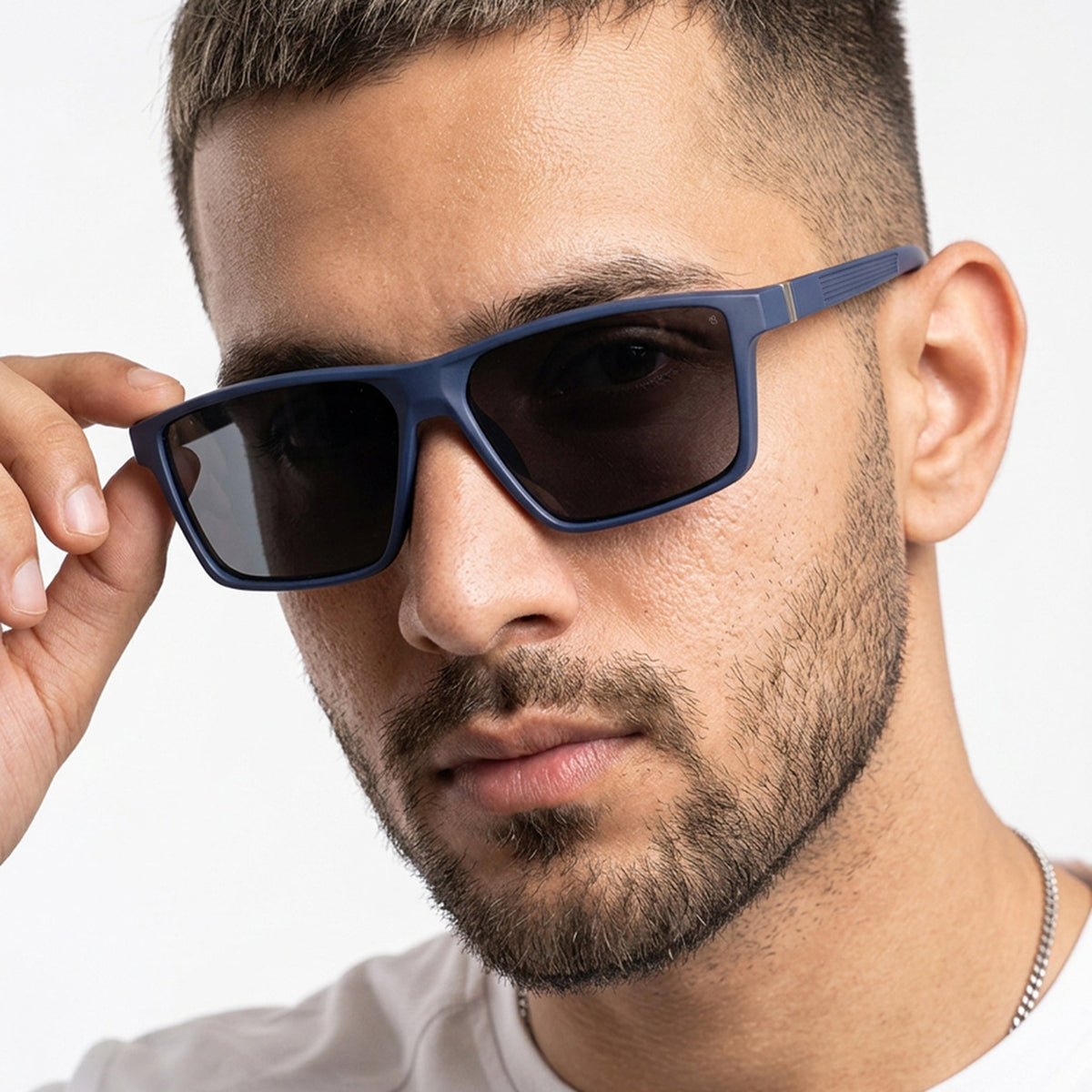 Eyejack Navy Blue Rectangle Sunglasses for Men and Women - worn by a male model (image 1)
