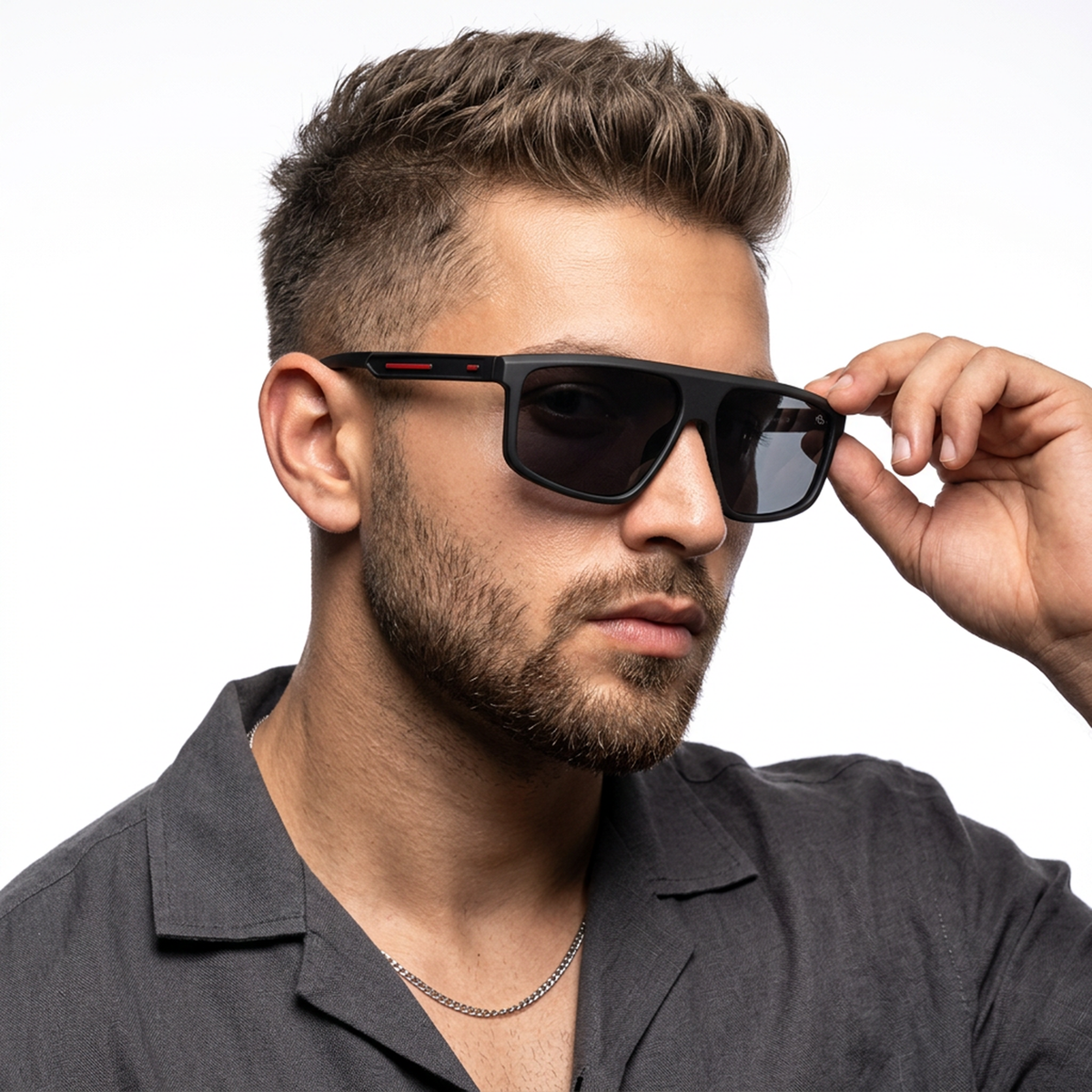 Eyejack Crossline Black Rectangle Sunglasses for Men and Women - Style 2056 - worn by a male model (image 1)