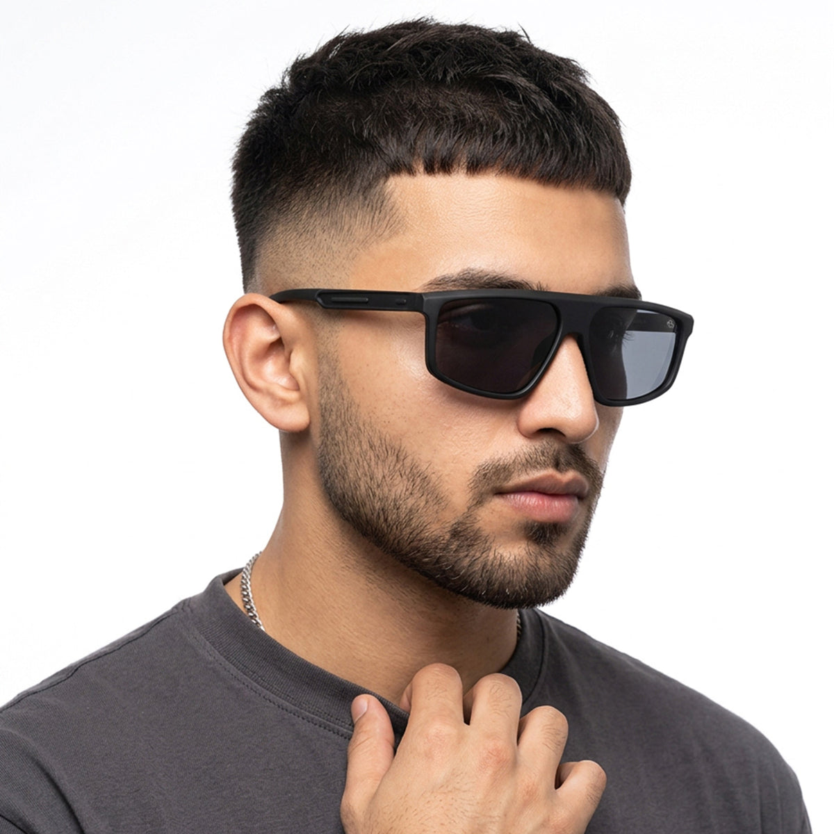Eyejack Crossline Black Rectangle Sunglasses for Men and Women - Style 2060 - worn by a male model (image 1)