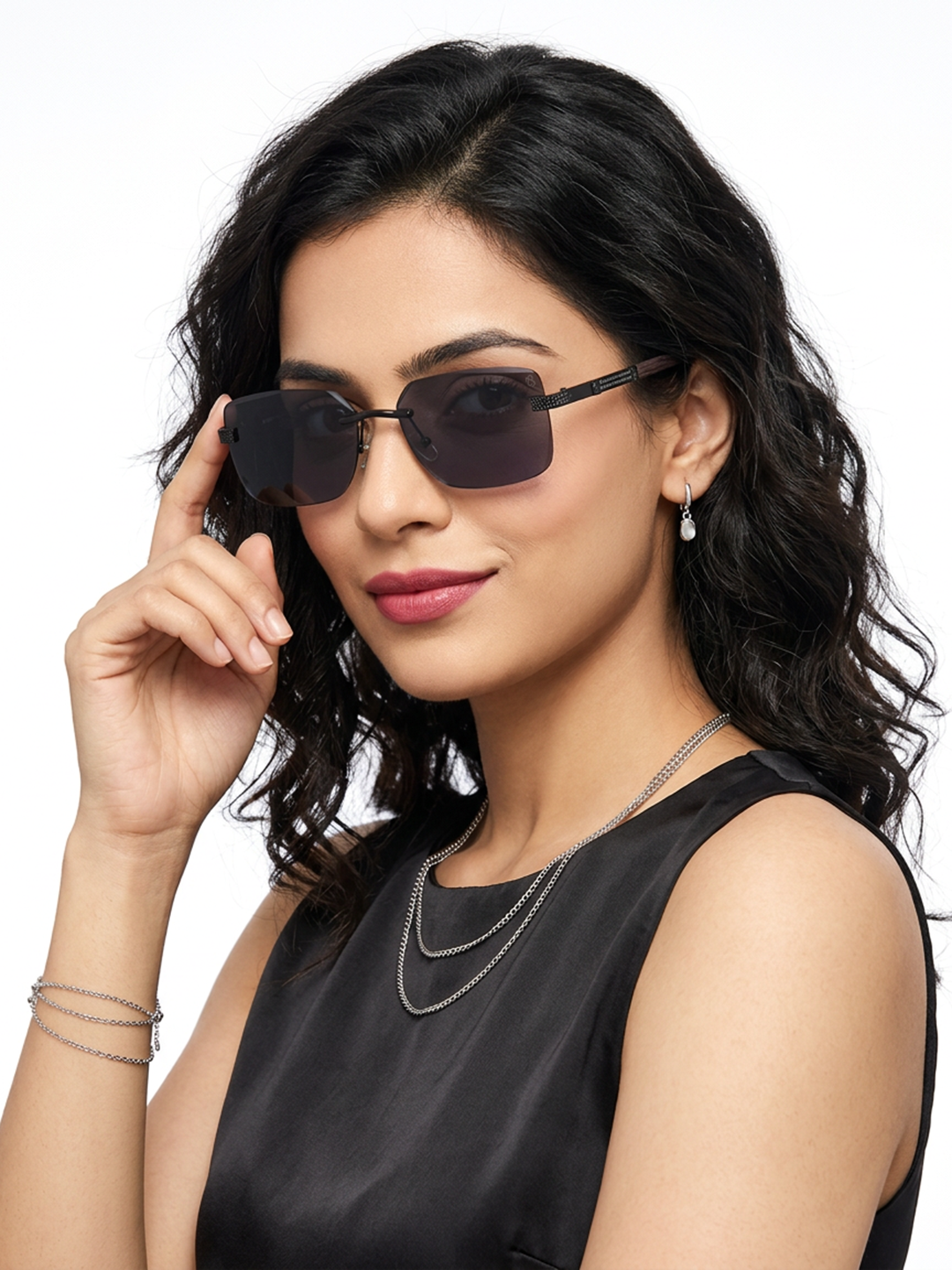 Essence Noble Black Rimless Sunglasses for Men and Women - worn by a male model (image 3)