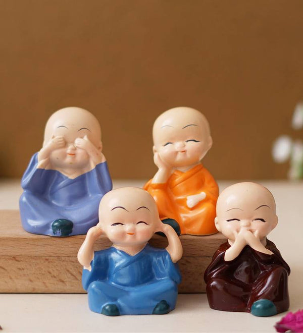 Casacraft by Pepperfry Cute Little Monks Figurines Set of 4 Decorative Showpiece - 5 cm (Polyresin, Orange)
