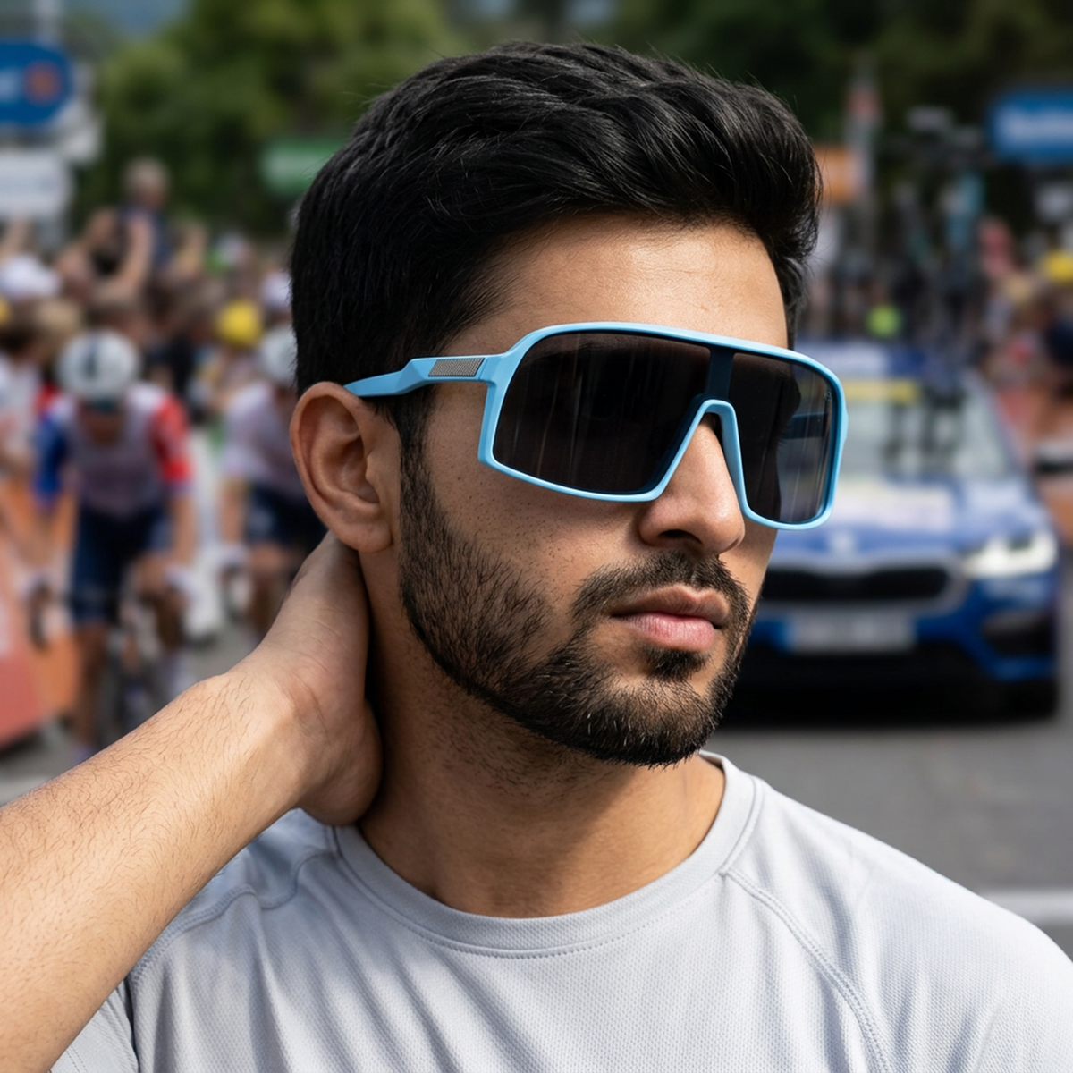 Eyejack Blue Wrap Around Sunglasses for Men and Women - Style 1299 - worn by a male model (image 1)