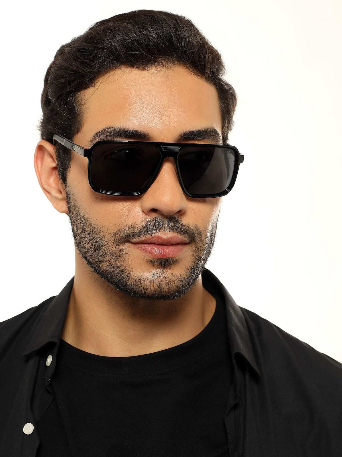 Eyejack Shine Black Square Sunglasses for Men and Women - Style 1115 - worn by a male model (image 1)