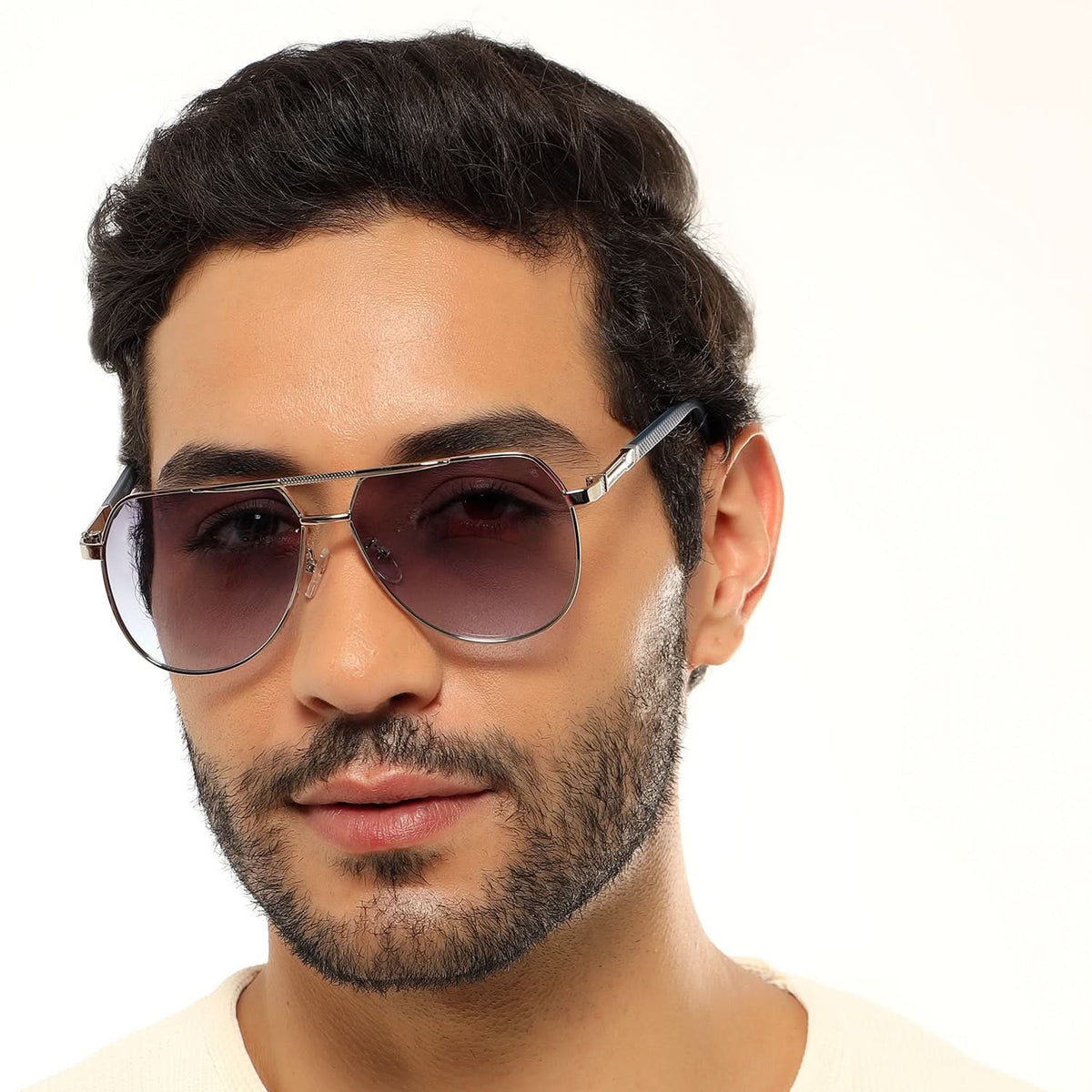 Eyejack Silver Aviator Sunglasses for Men and Women - worn by a male model (image 1)