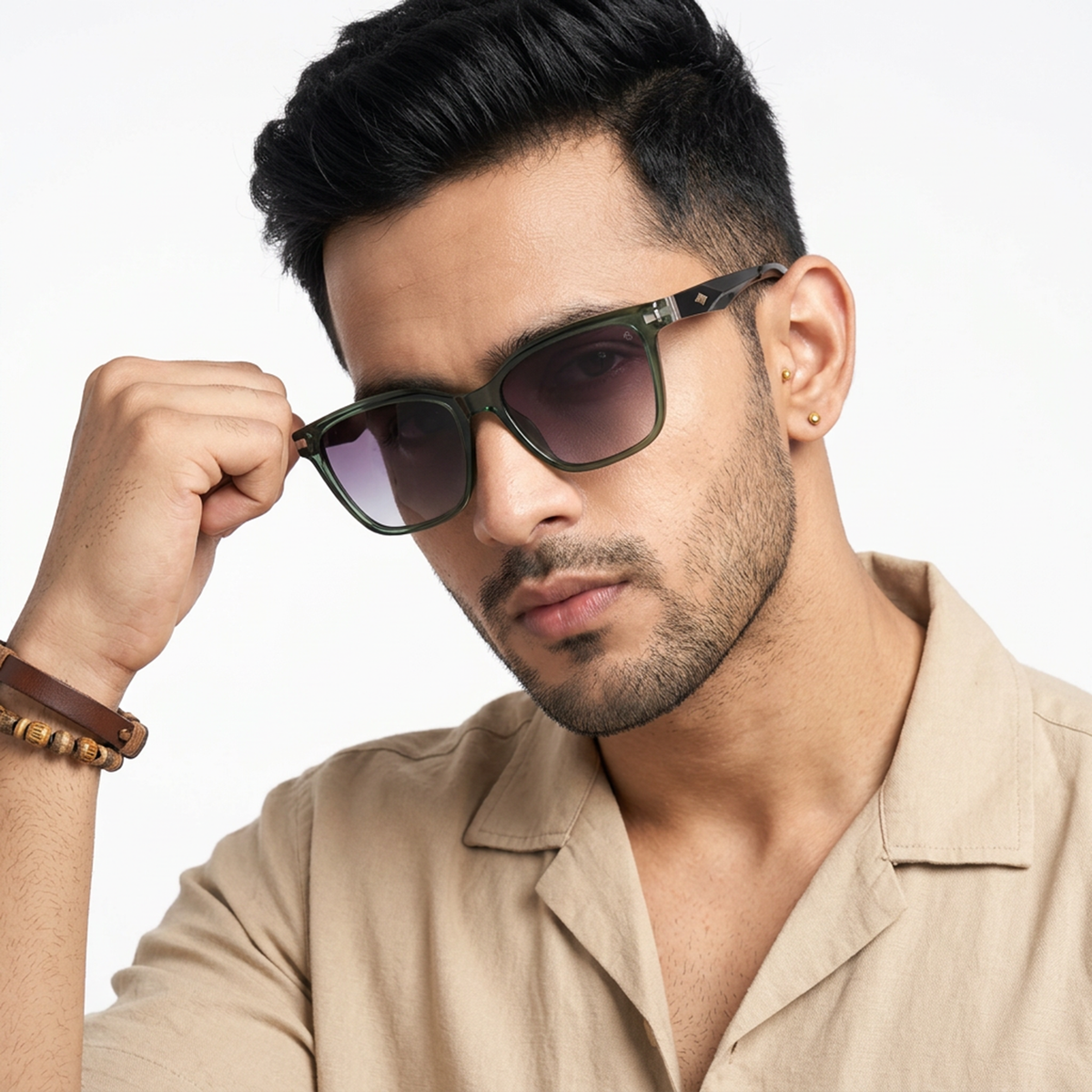 Eyejack Olive Square Sunglasses for Men and Women - Style L774 - worn by a male model (image 1)