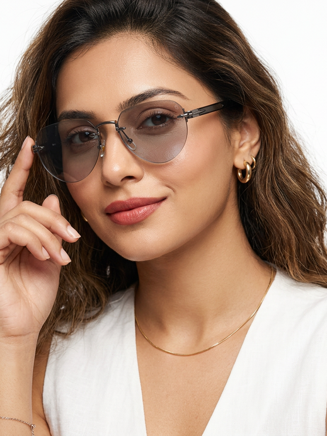 Essence Crown Silver Rimless Sunglasses for Men and Women - worn by a male model (image 3)