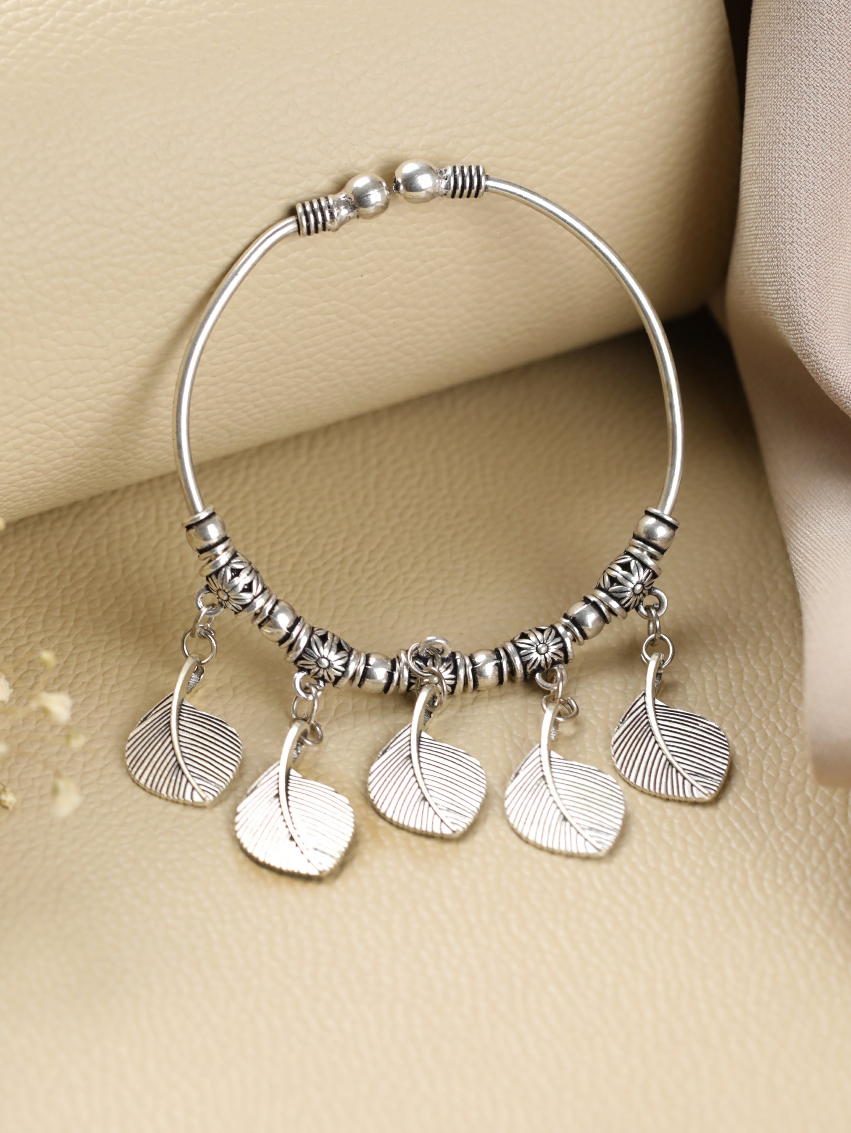 Women Oxidised Silver-Toned & Oxidised Tribal Brass Leaf Charm Bracelet