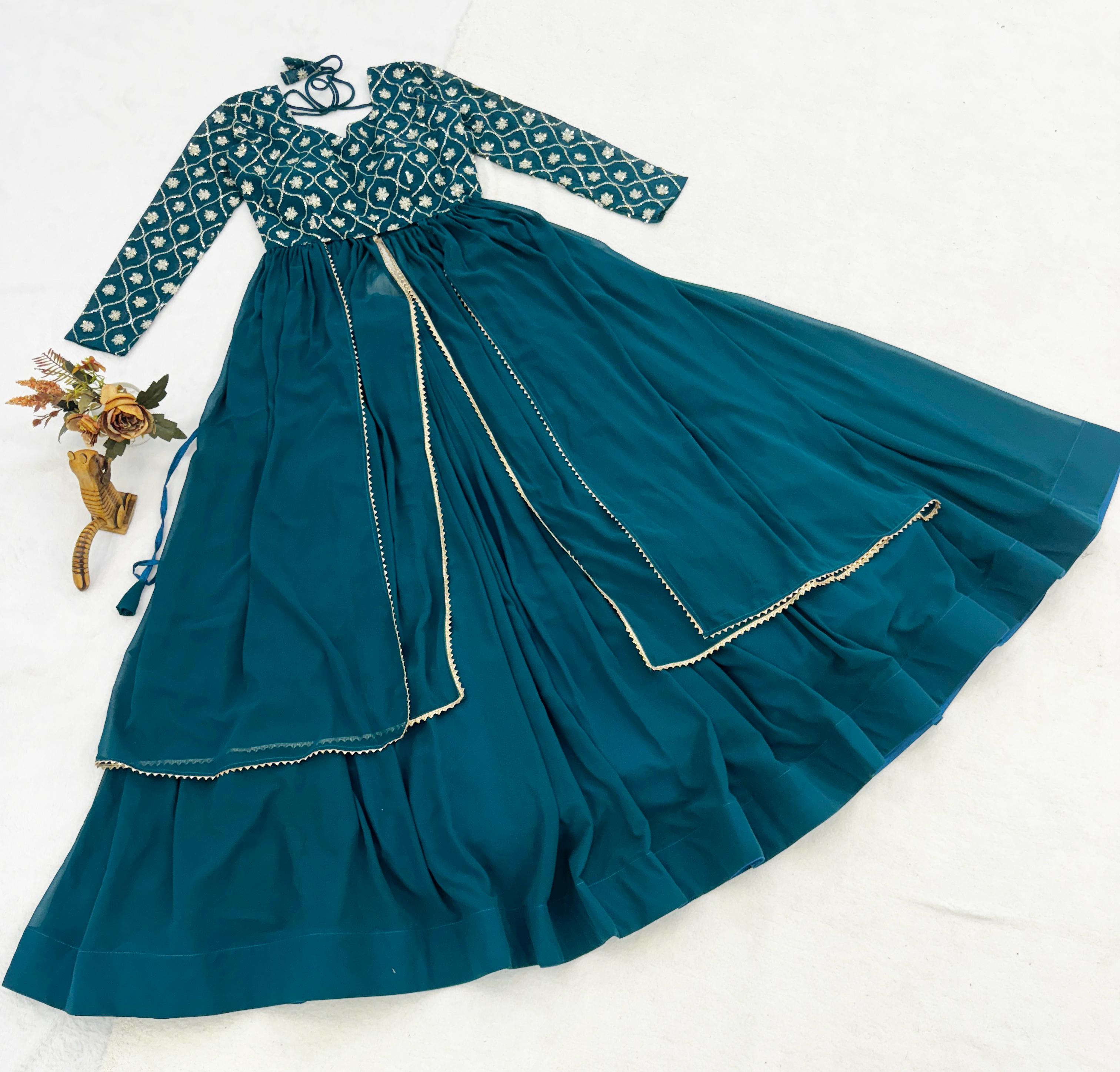Trending Gorgette Lehenga With Traditional Embroidery Top