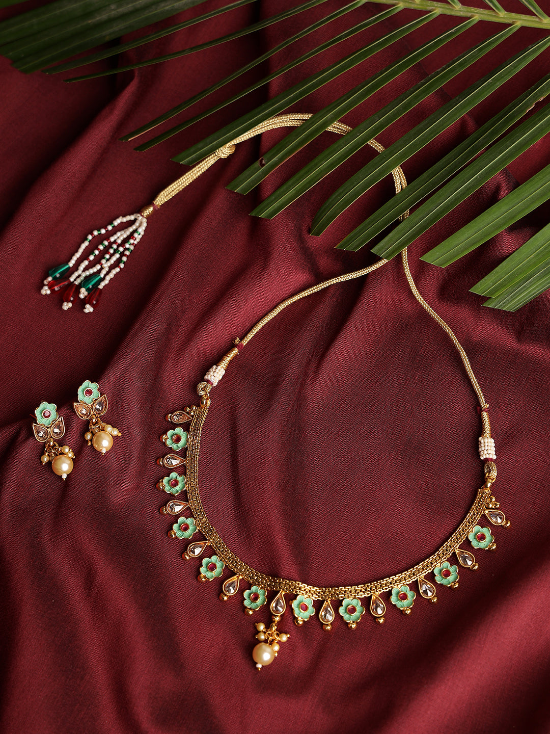 Gold Plated & White Stone Studded Green Enameled Handcrafted Jewellery Set