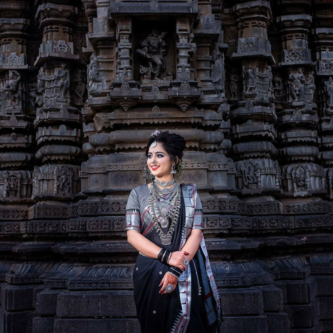 AXONIT Cultural Classic Black Cotton Saree with Elegant Silver Zari Work and Festive Red Border