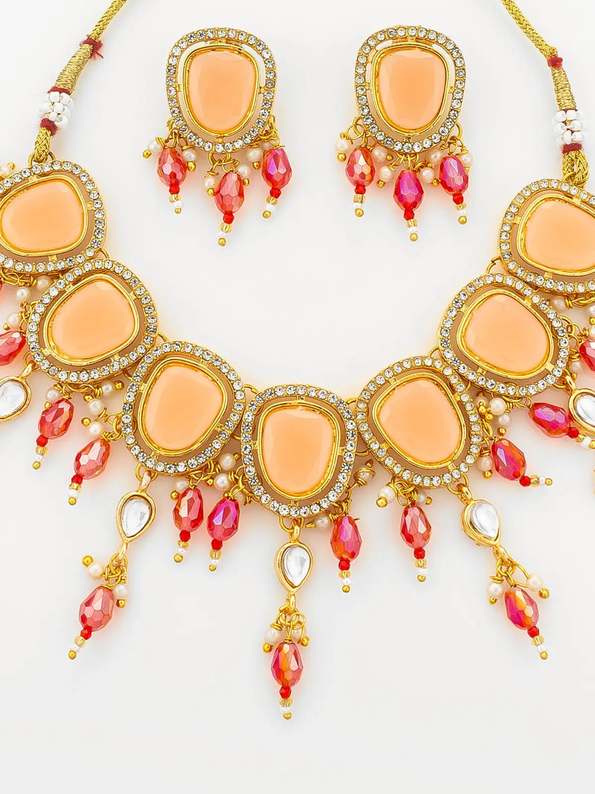 Aadita Gold Plated Peach Stone Choker Necklace with Dangles