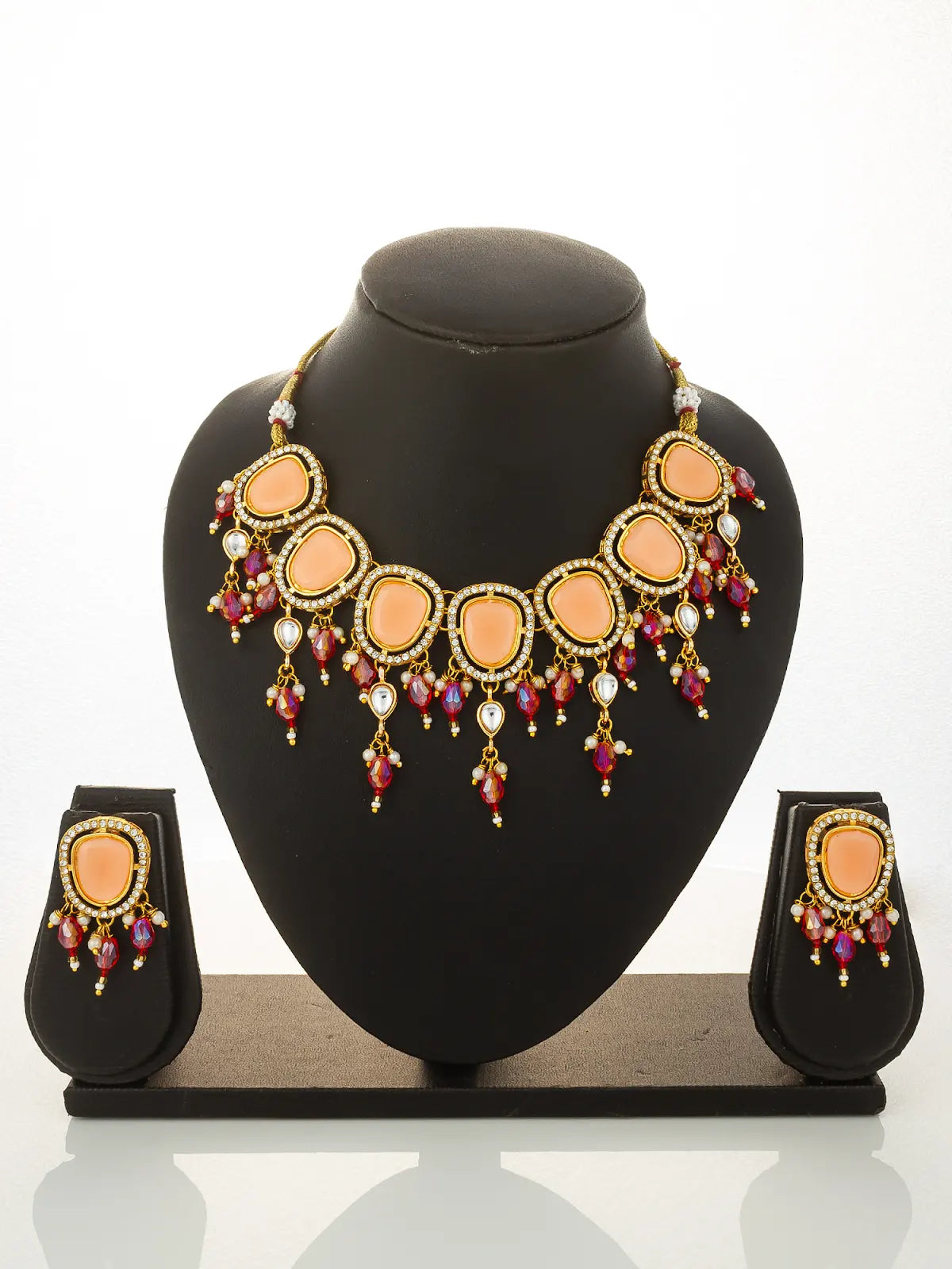 Aadita Gold Plated Peach Stone Choker Necklace with Dangles