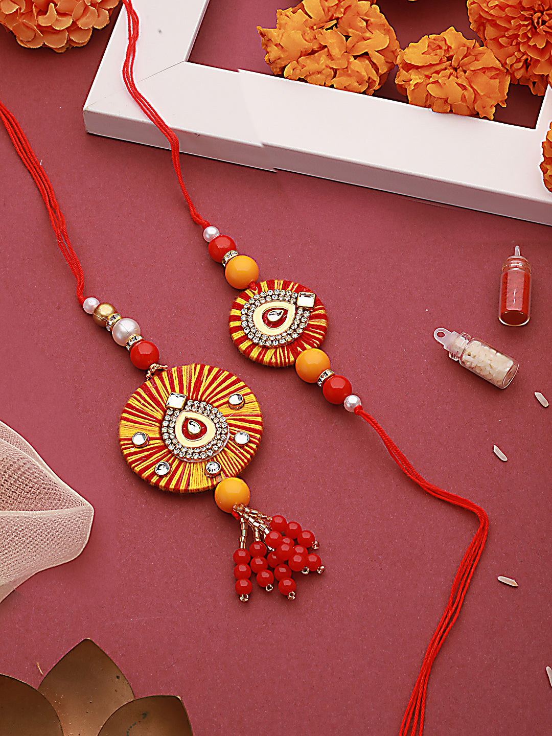 Jazz And Sizzle Set Of 2 Round Shaped Orange Kundan & Pearl Beaded Bhaiya Bhabhi Rakhi