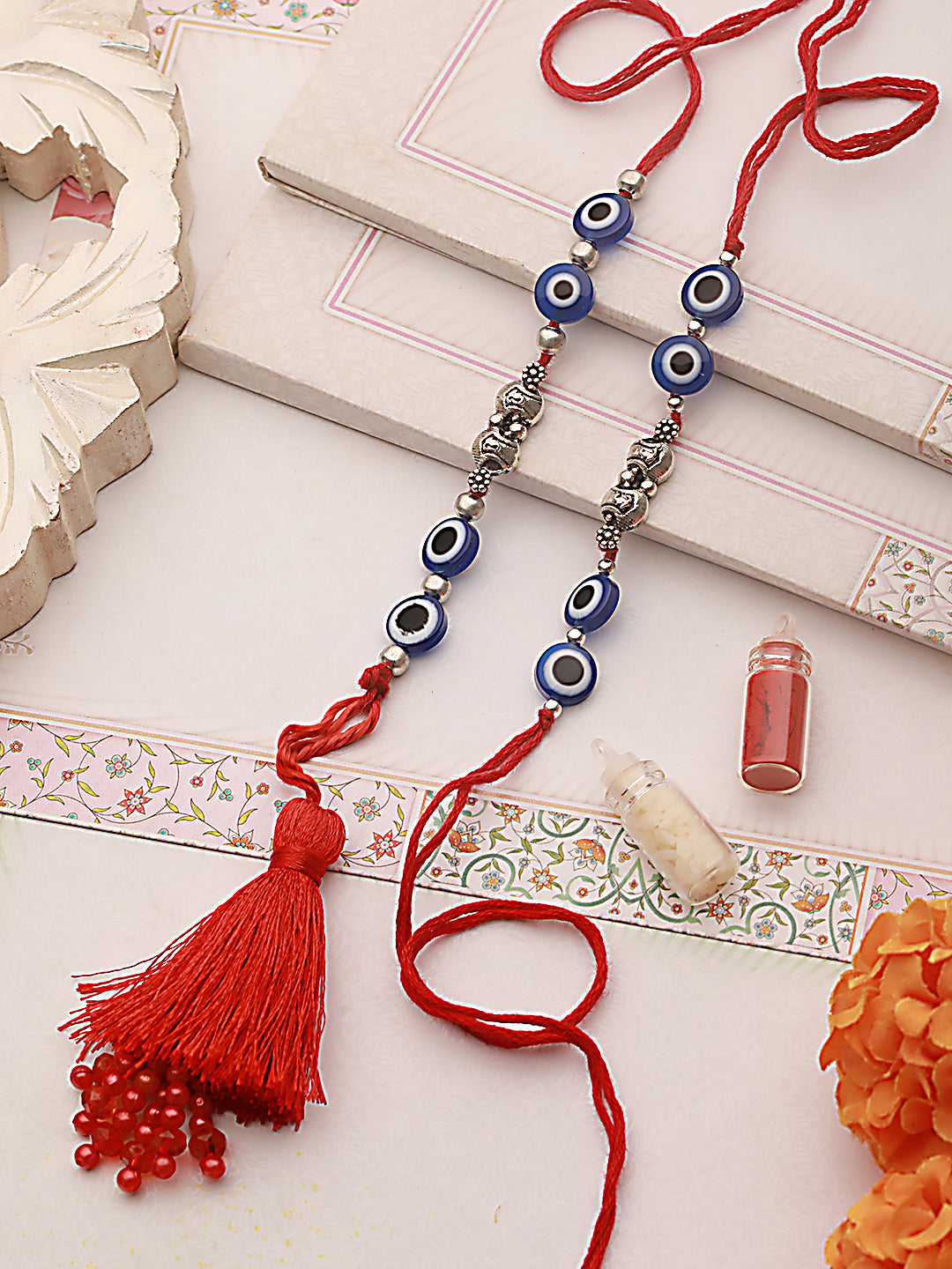 Jazz And Sizzle Set Of 2 Evil Eye Bhaiya Bhabhi Tasseled Rakhi With Roli & Chawal