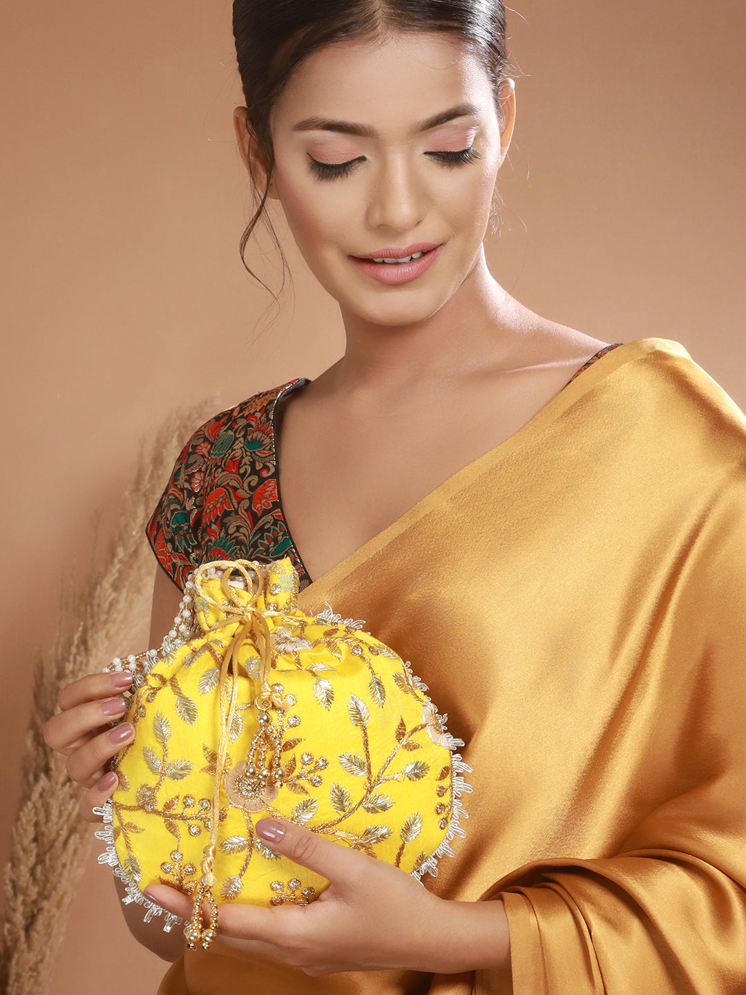 Yellow & Gold-Toned With Rich Embroidered Potli Clutch