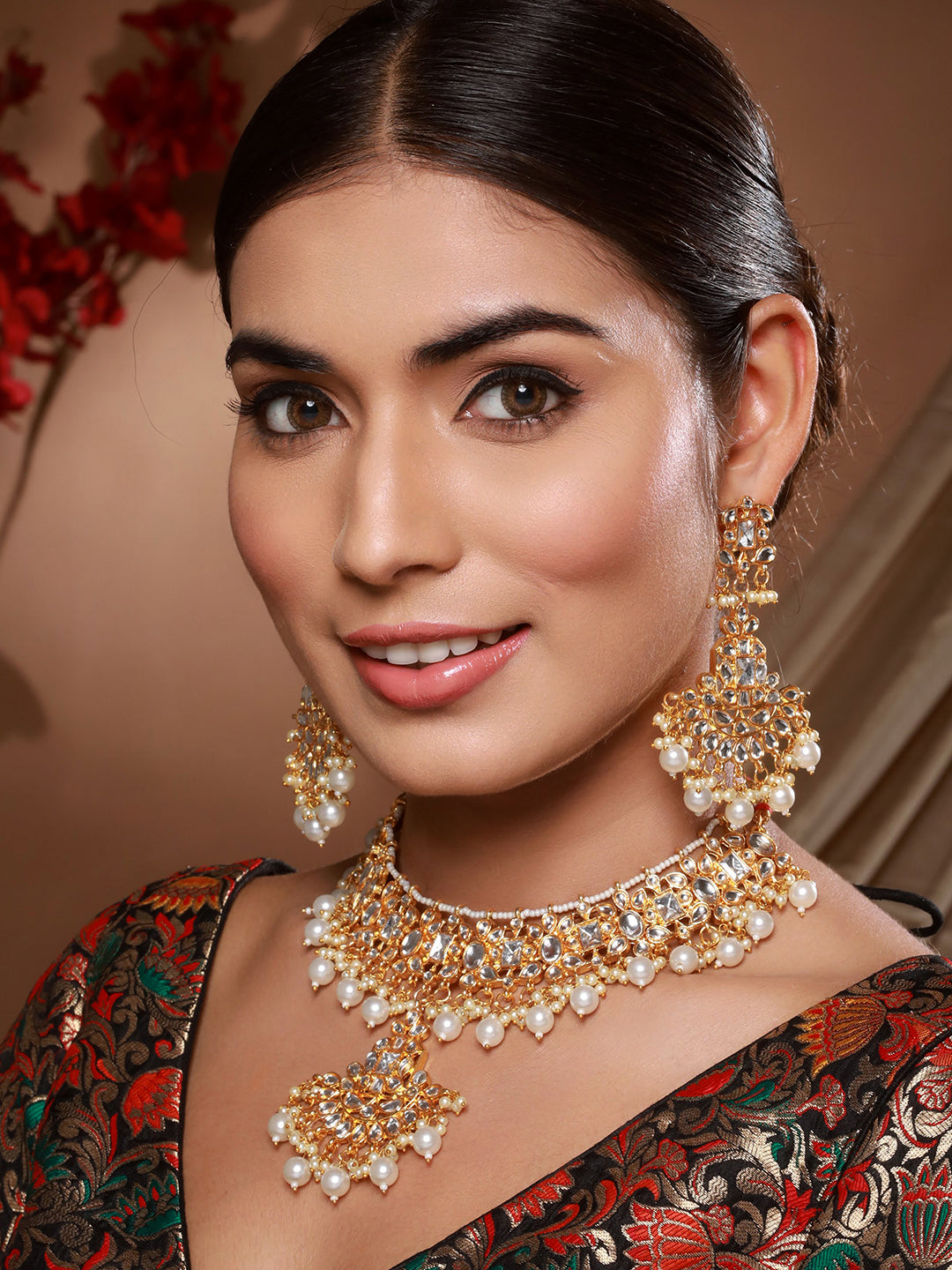 Jazz And Sizzle Gold Plated kundan Studded & Faux Pearl Beaded Choker Jewellery Set with Maangtikka