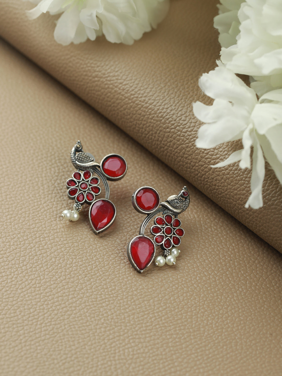 Silver Toned Oxidised-Pink Stone Studded Contemporary Peacock Shaped Drop Earrings