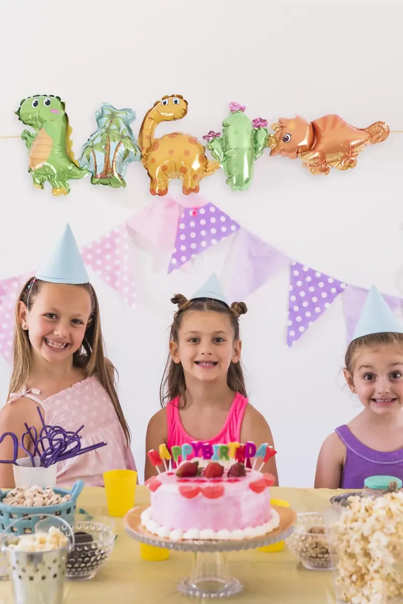 1735798423255__1735798422858__portrait-smiling-kids-wearing-party-hat-celebrating-birthday-party2