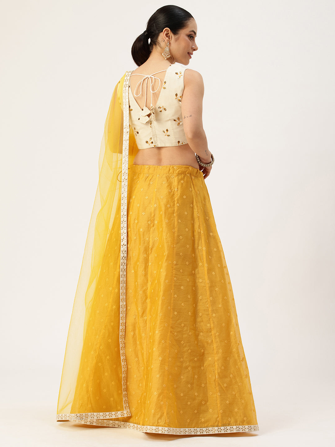 Bollywood Vogue Ready To Wear Off White N Mustard Embroidered Cotton Lehenga Set - Back View