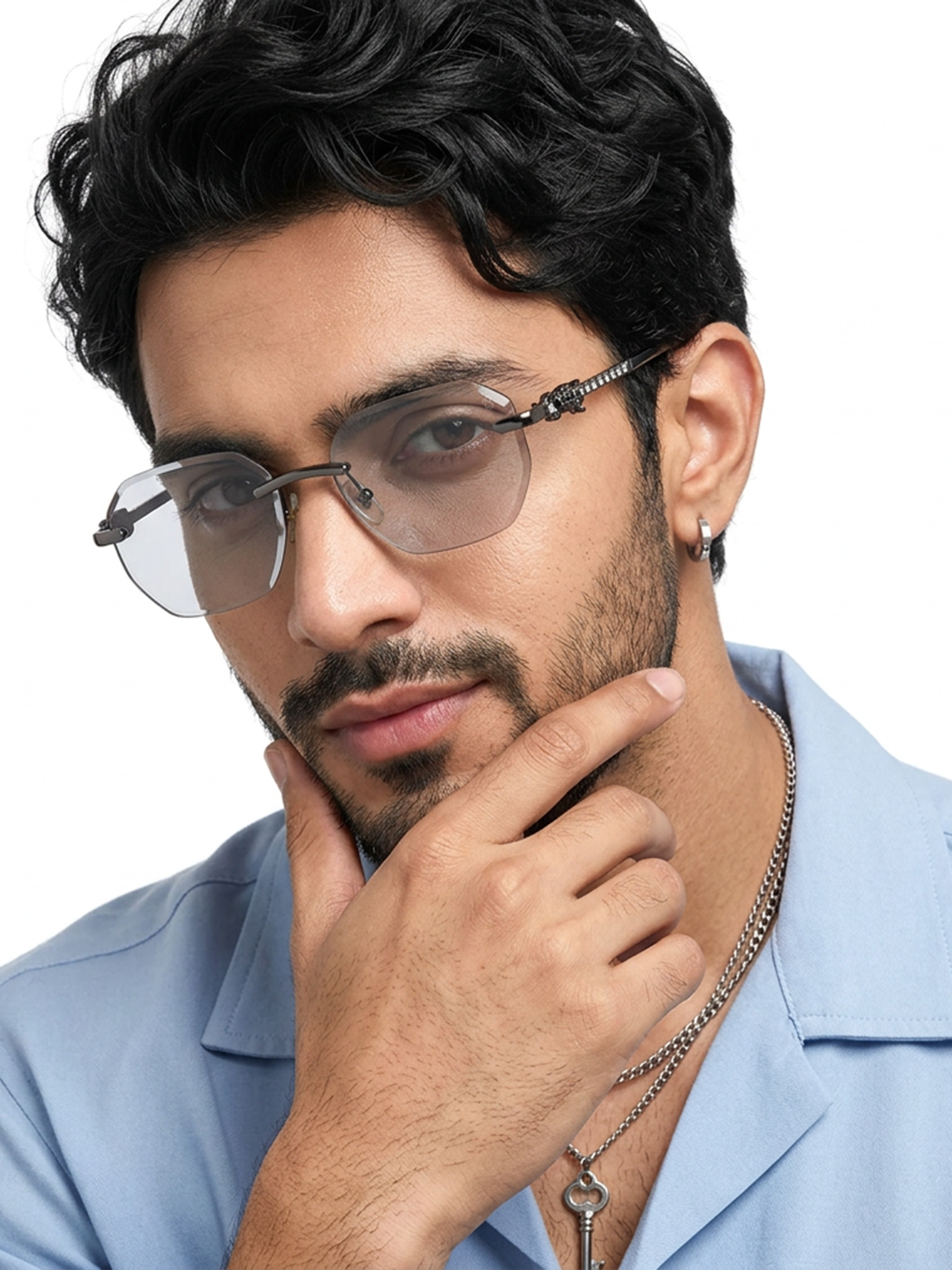 Essence Clarity Grey Rimless Sunglasses for Men and Women - worn by a male model (image 1)