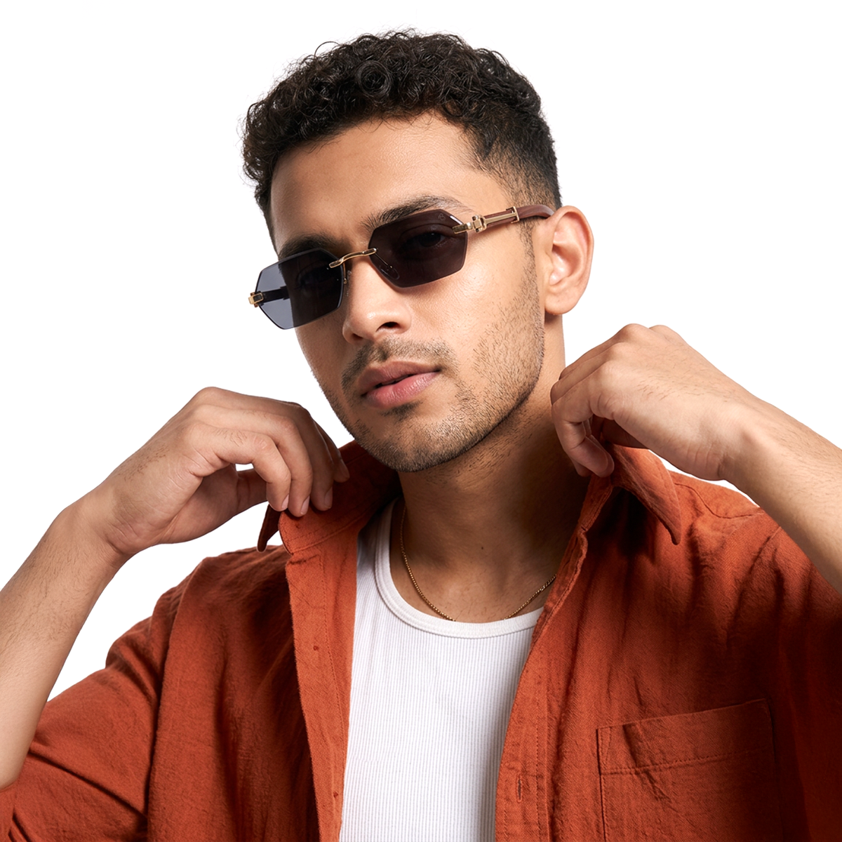 Essence Steel Golden Rimless Sunglasses for Men and Women - Style 2563 - worn by a male model (image 1)