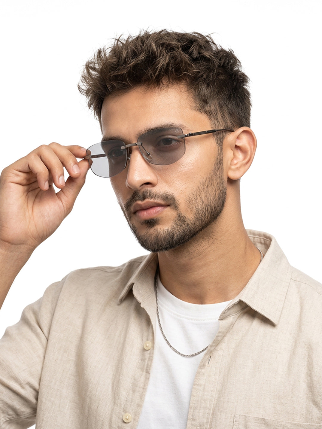 Essence Royal Black Rimless Sunglasses for Men and Women - worn by a male model (image 1)