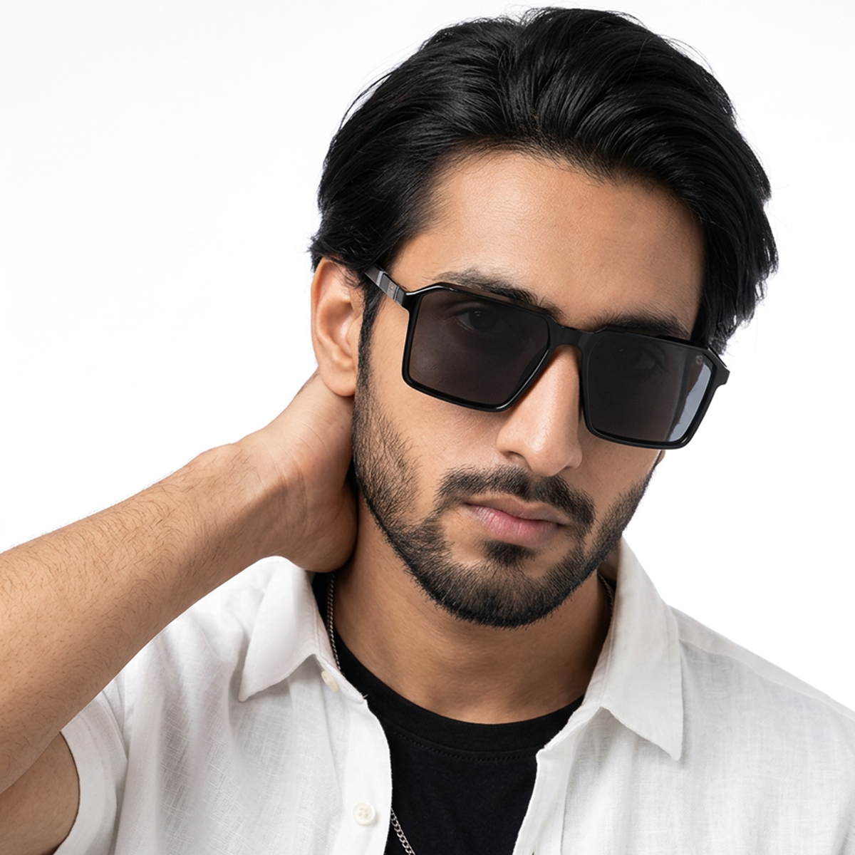 Eyejack Shine Black Square Sunglasses for Men and Women - Style 1120 - worn by a male model (image 1)