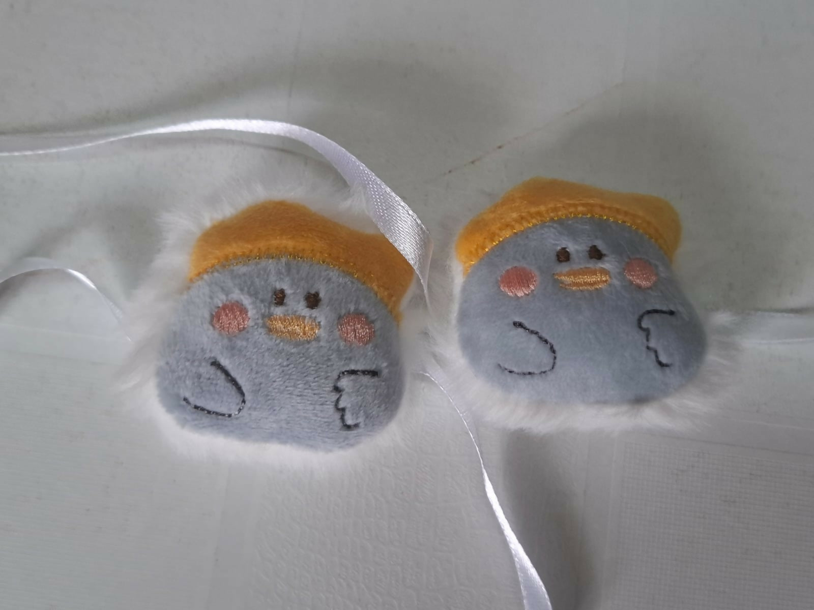 Adorable Plush Penguin Brooch Rakhi with Soft Faux Fur and Ribbon - Set of 2