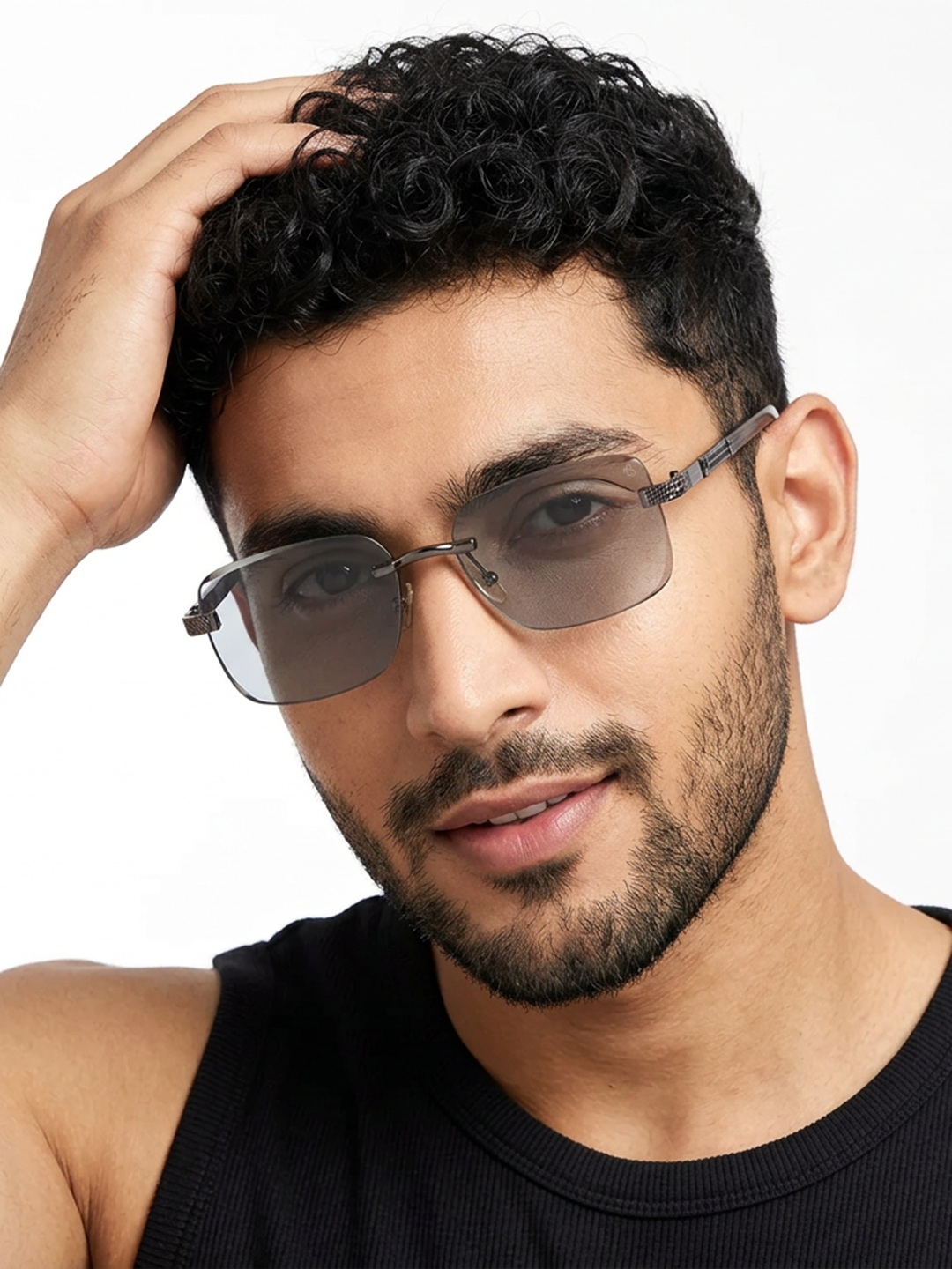 Essence Noble Grey Rimless Sunglasses for Men and Women - worn by a male model (image 1)