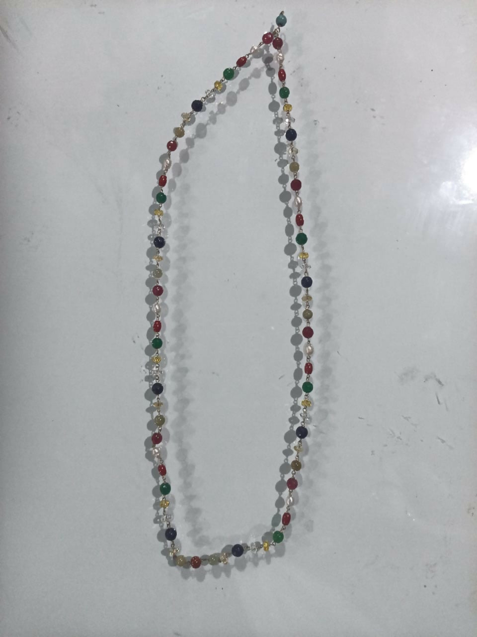 Navaratna Mala – Sacred Nine Gemstone Beaded Necklace with Traditional Gold-Tone Pendant for Astrology & Spiritual Balance