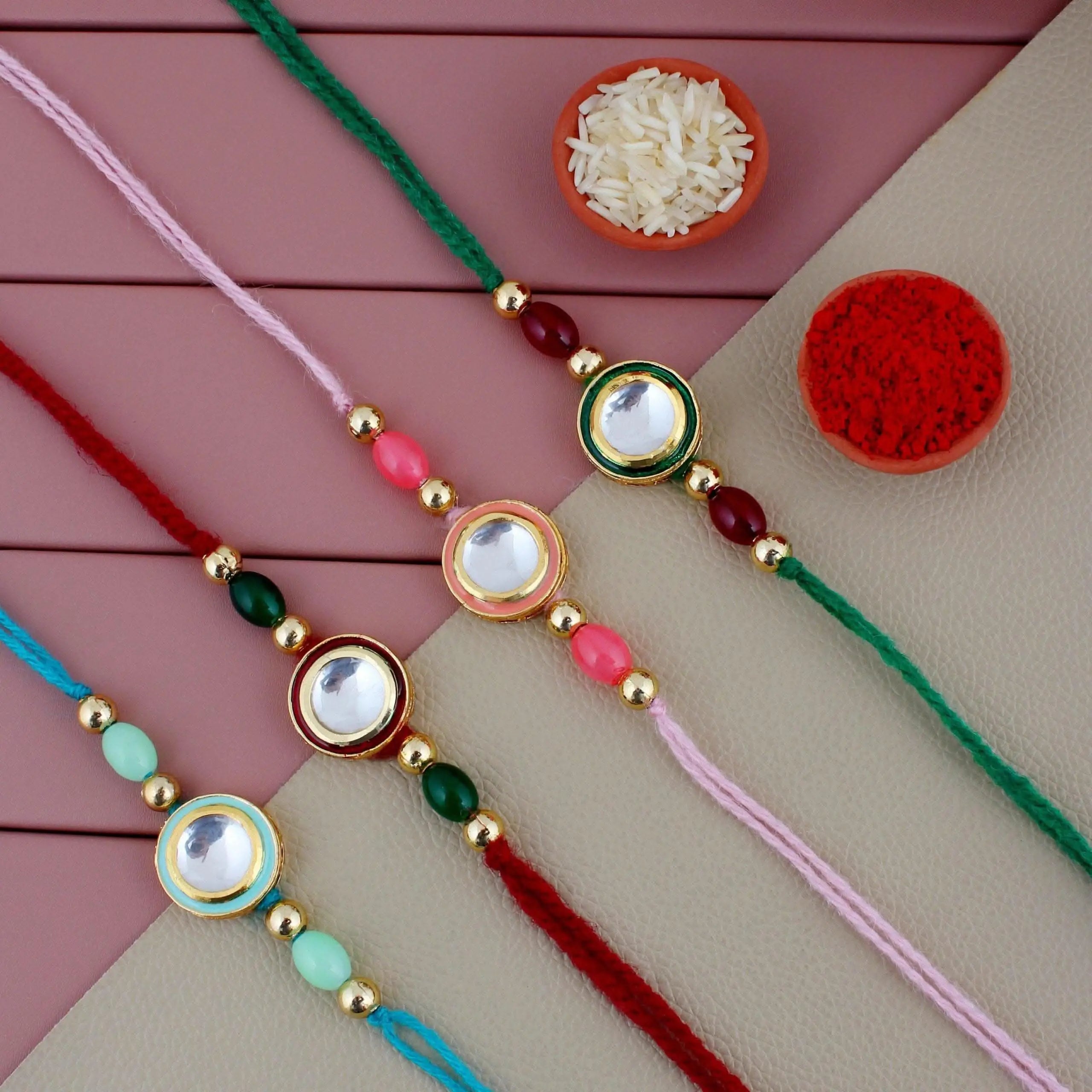 Designer Gold-Plated ferozi color meena thread rakhi (pack of 4) | LUCKY JEWELLERY - halfpeapp