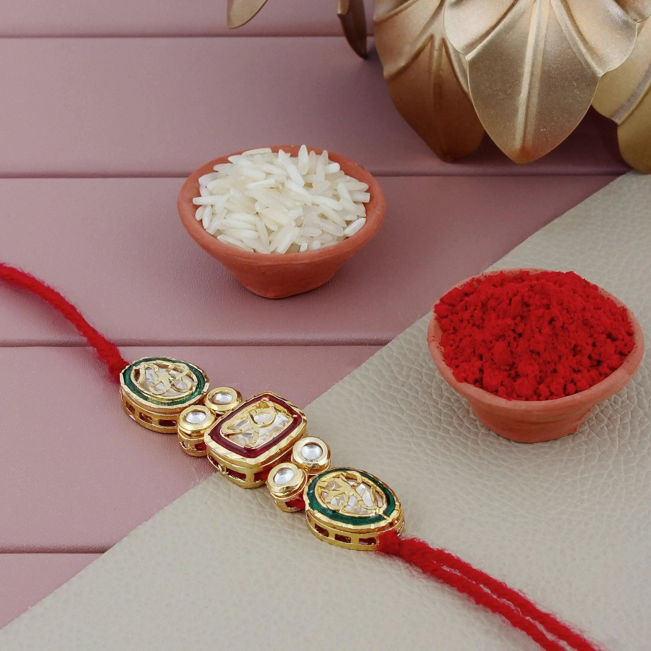 Designer Gold-Plated ferozi color meena thread rakhi with oval and square shaped dollars | LUCKY JEWELLERY - halfpeapp
