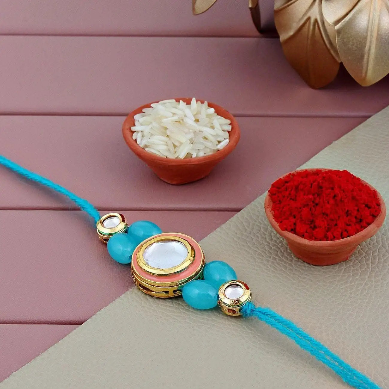 Designer Gold-Plated ferozi color meena thread rakhi with silver stone and rama green beads | LUCKY JEWELLERY - halfpeapp