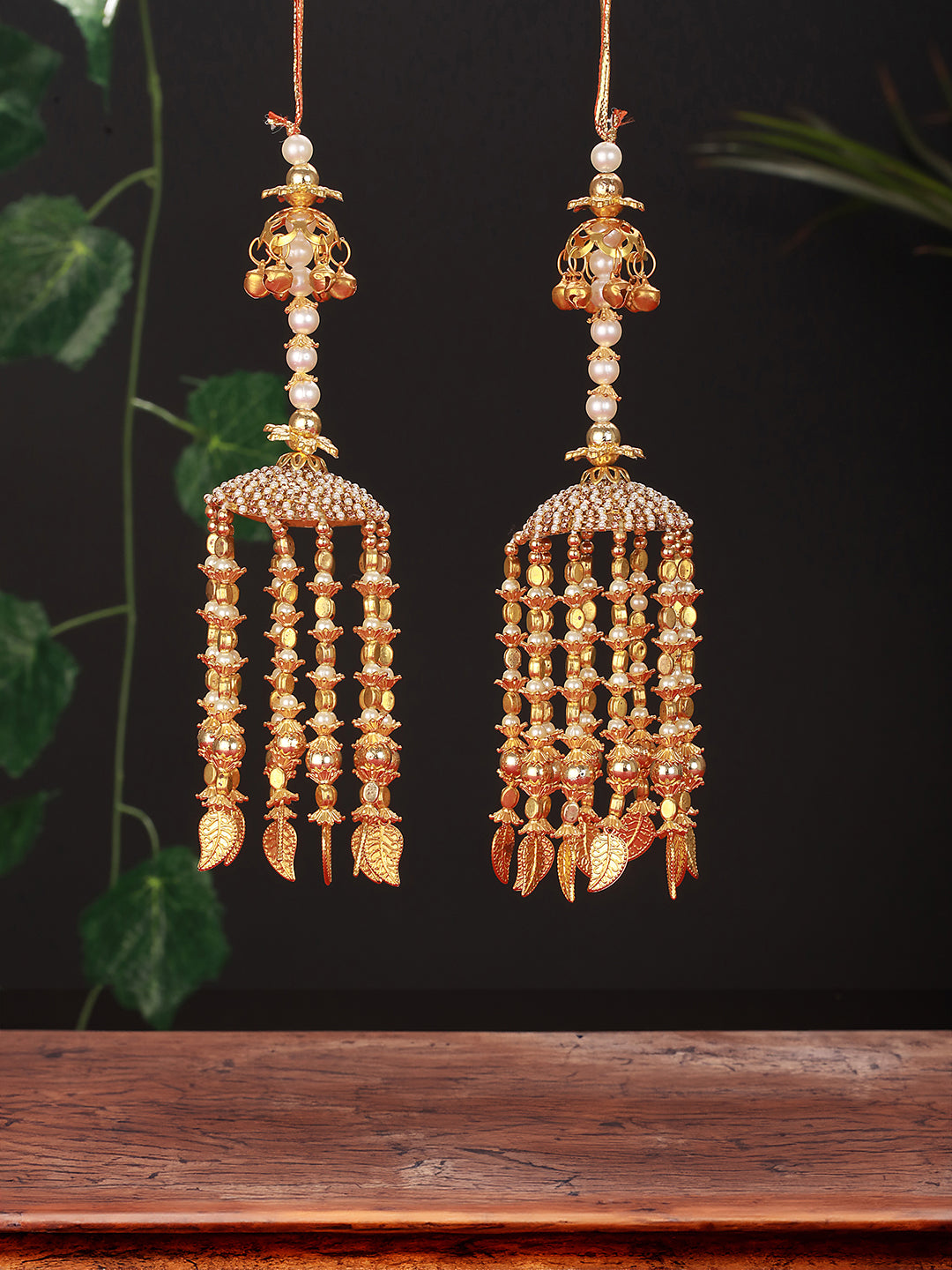 Set Of 2 Gold-Plated Stone-Studded & Beaded Kaleera Secured With Drawstring Closure.