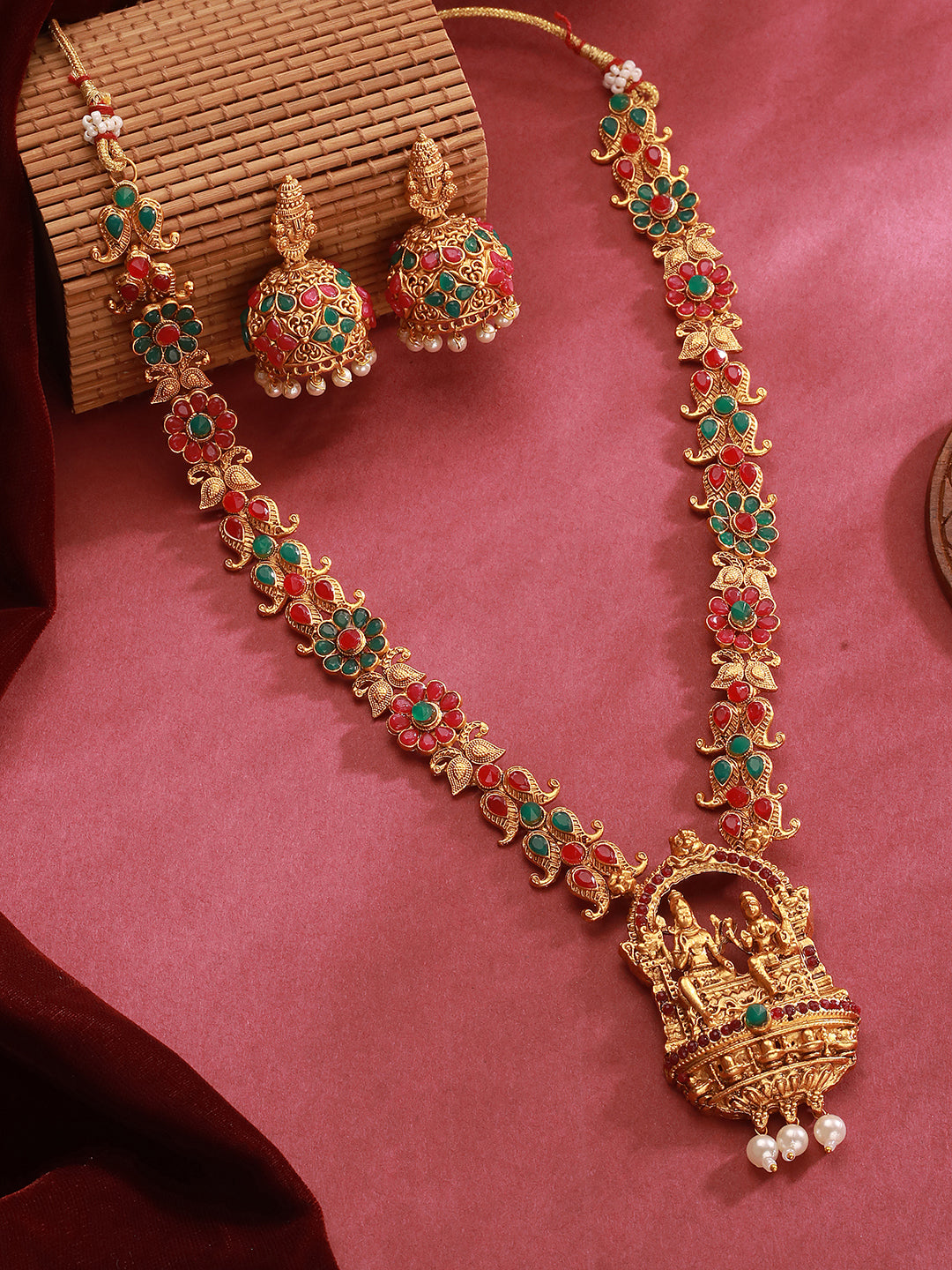 Jazz And Sizzle Gold-Plated Ruby & Emerald Stone-Studded Goddess Motif Temple Jewelry Set with Pearl & Gold Beads