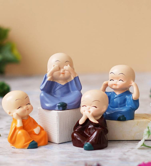 Casacraft by Pepperfry Cute Little Monks Figurines Set of 4 Decorative Showpiece  -  5 cm  (Polyresin, Orange)