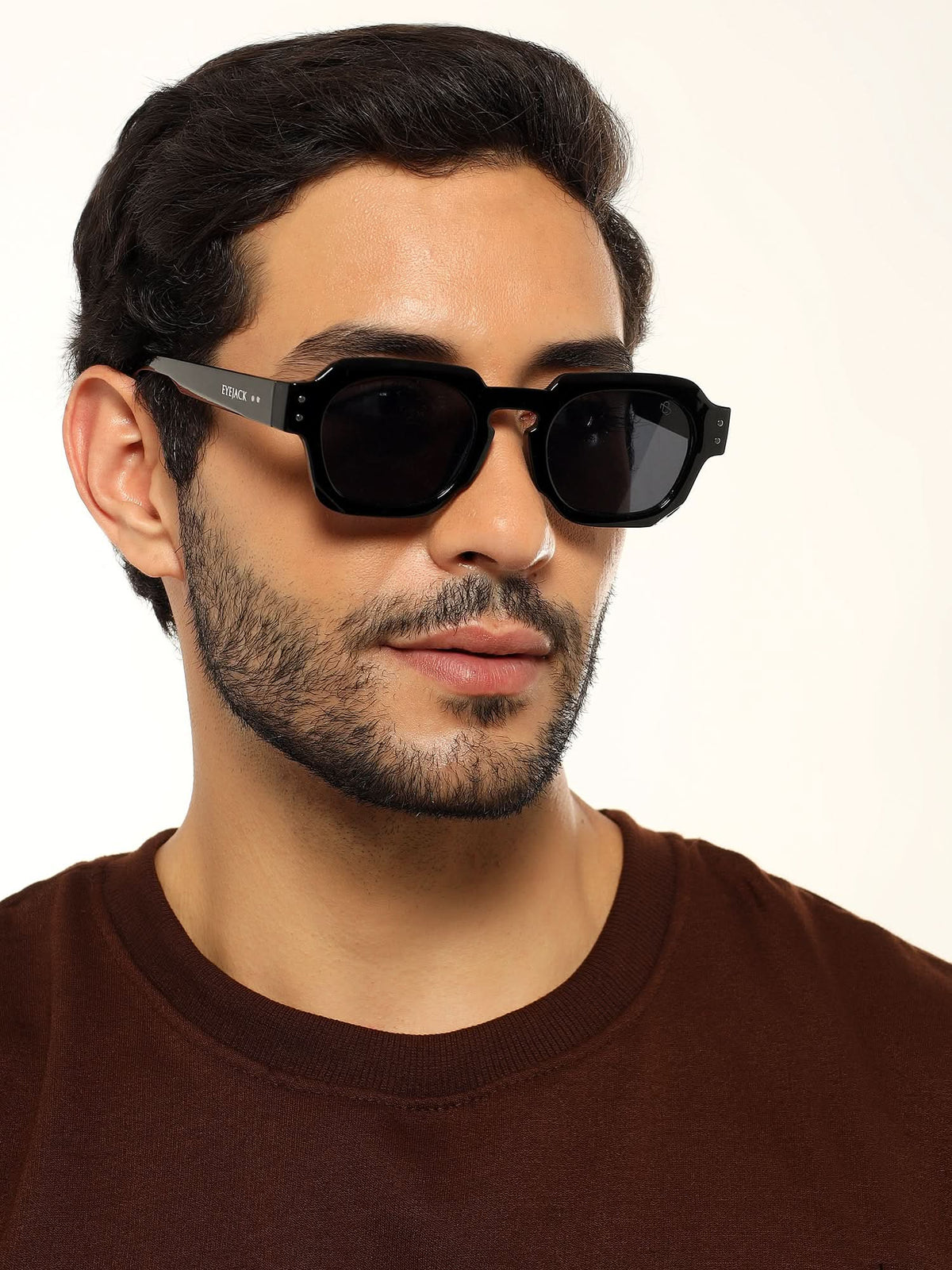 Milan Black Round Sunglasses for Men and Women - Style L990 - worn by a male model (image 1)