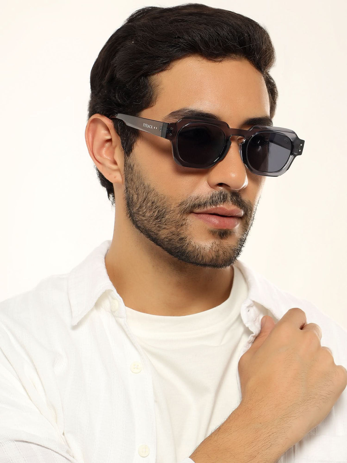 Milan Grey Round Sunglasses for Men and Women - worn by a male model (image 1)