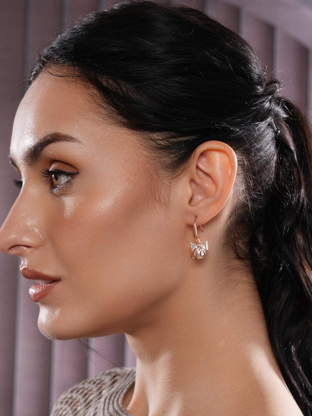 Jazz And Sizzle Rose Gold-Plated Bow Shaped Pearl Studded Drop Earrings
