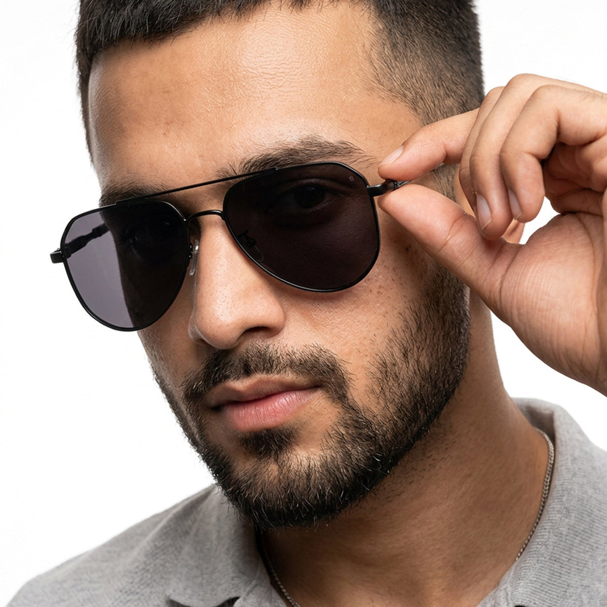Eyejack Black Aviator Sunglasses for Men and Women - Style 2122 - worn by a male model (image 1)