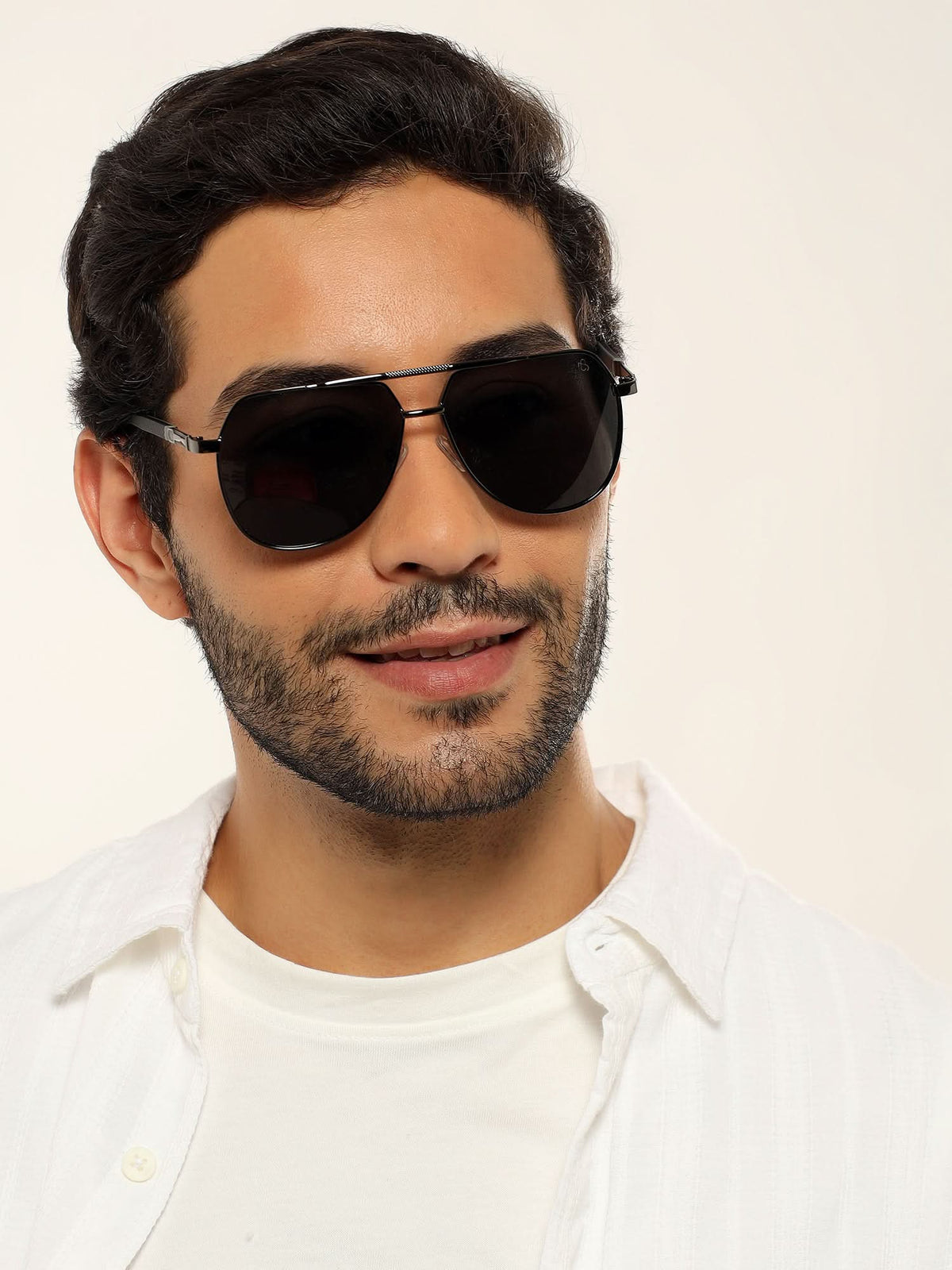 Eyejack Grey Aviator Sunglasses for Men and Women - worn by a male model (image 1)
