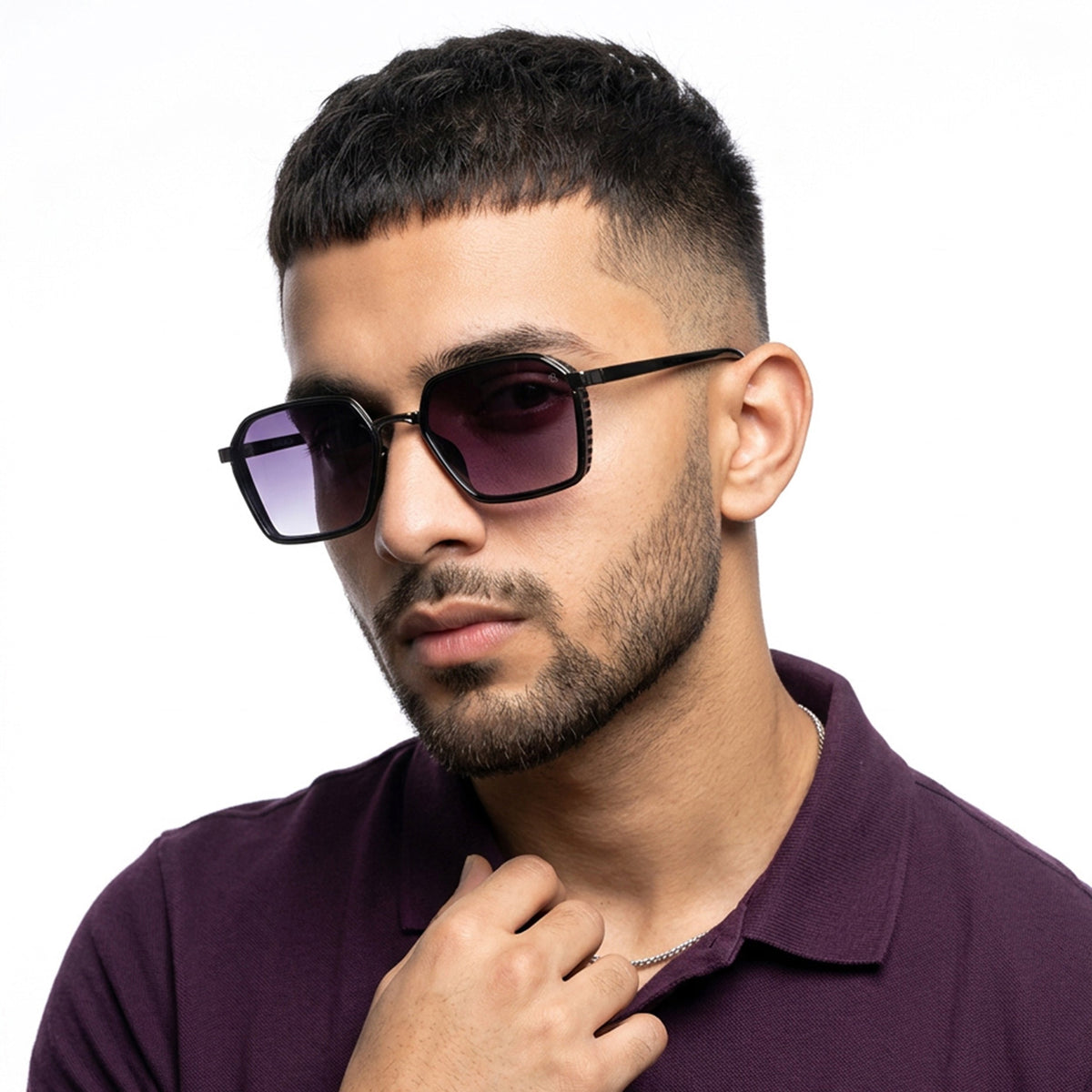 Eyejack Dark Grey Hexagonal Sunglasses for Men and Women - worn by a male model (image 1)