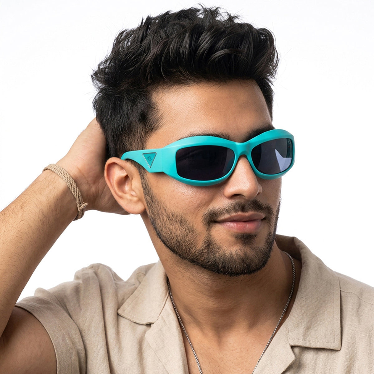 Eyejack Sea Green Wrap Around Sunglasses for Men and Women - worn by a male model (image 1)