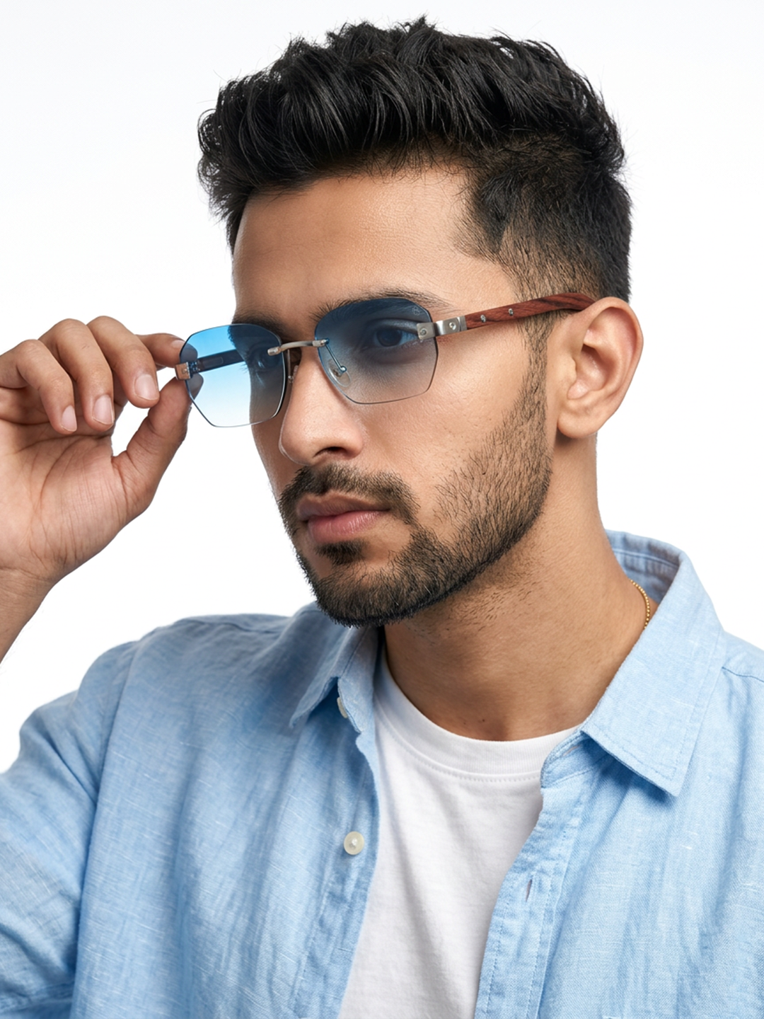Essence Amber Silver Rimless Sunglasses for Men and Women - worn by a male model (image 1)