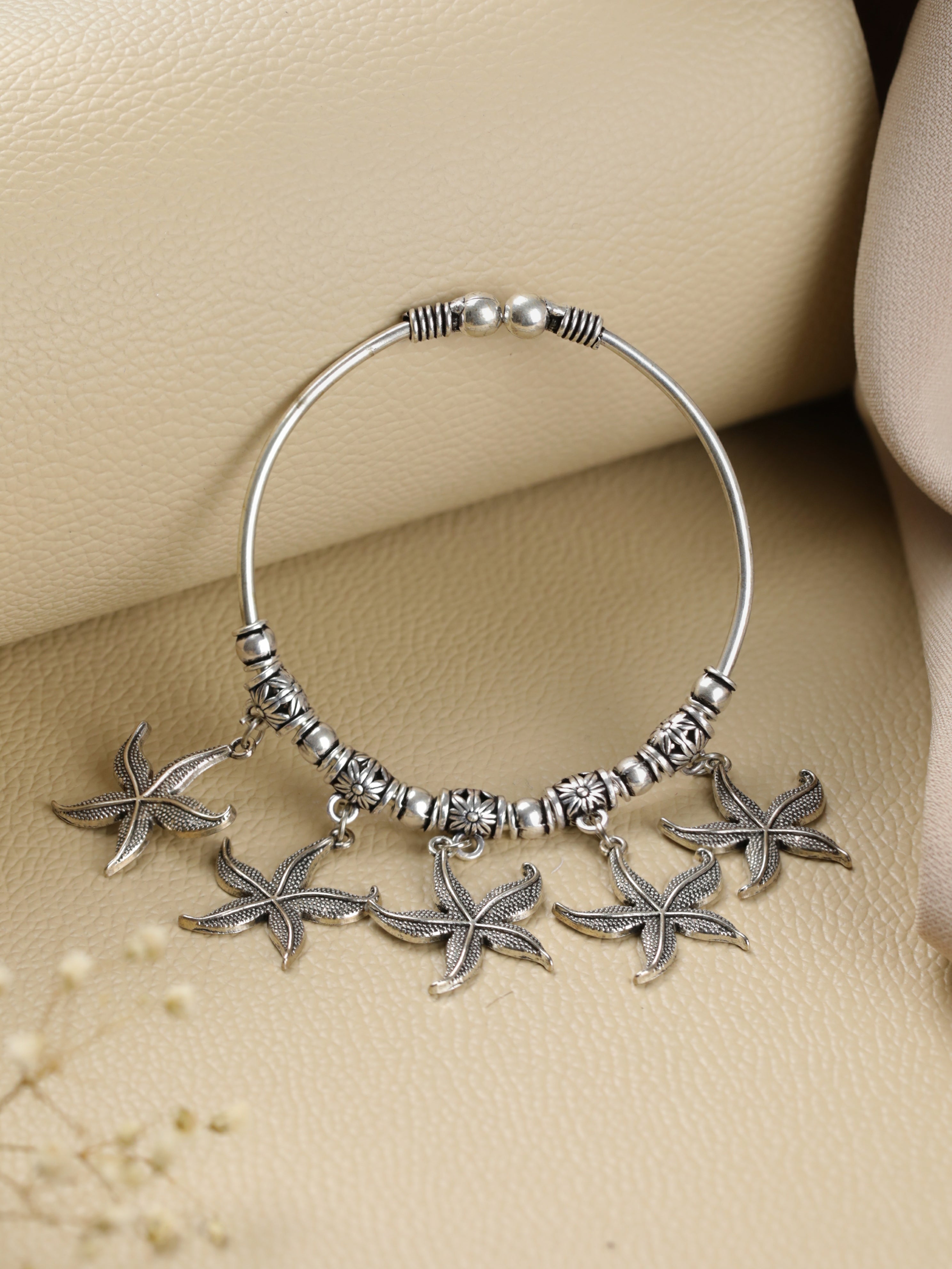Women Oxidised Silver-Toned & Oxidised Tribal Brass Star Charm Bracelet