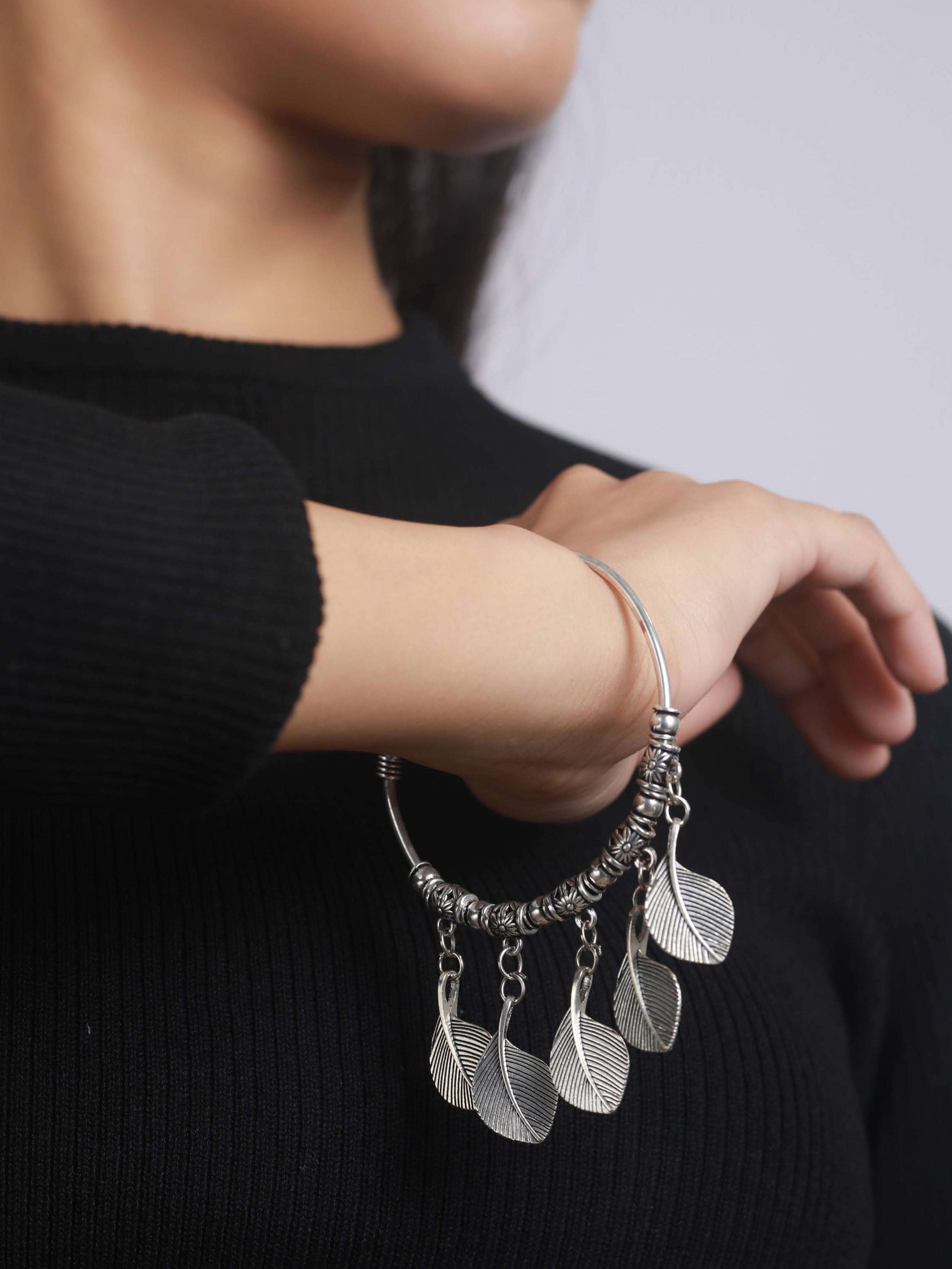 Women Oxidised Silver-Toned & Oxidised Tribal Brass Leaf Charm Bracelet