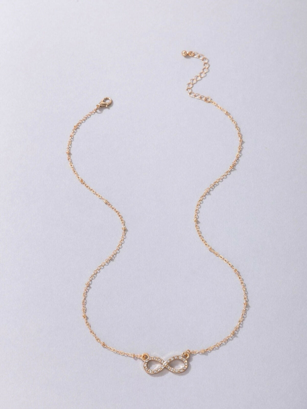 Charming 2-Piece Gold Layered Necklace Set with Infinity & Cute Pendant