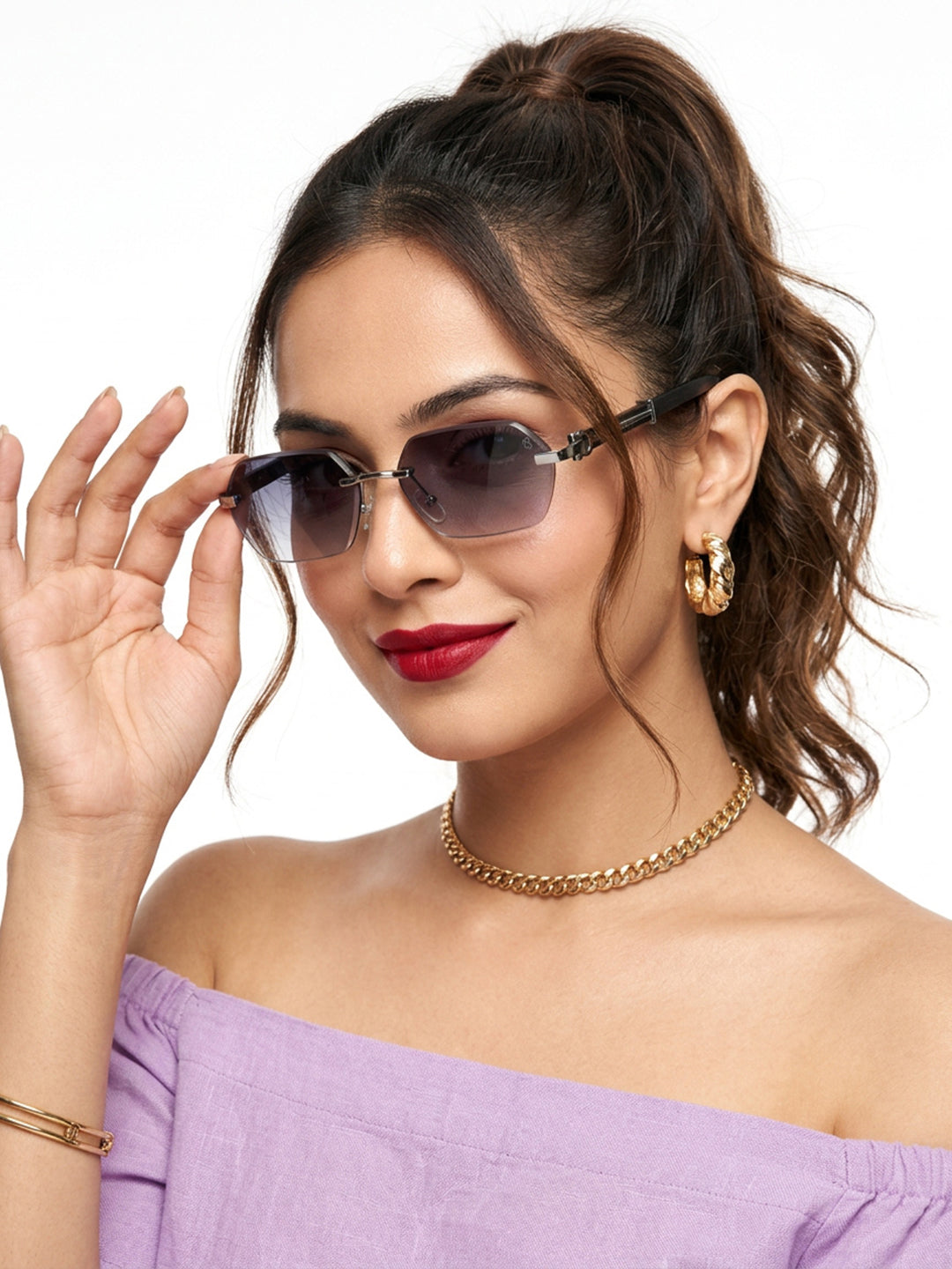 Essence Steel Silver Rimless Sunglasses for Men and Women - Style 2561 - worn by a male model (image 3)