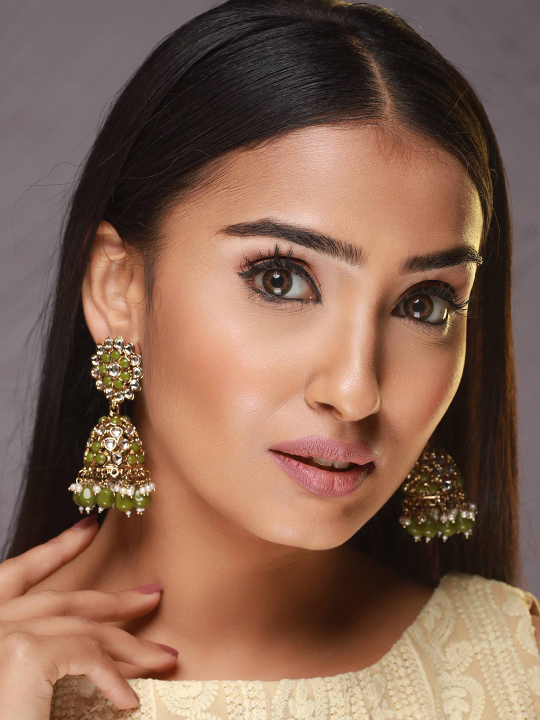 Gold Plated Green & White Kundan Studded & Pearl Beaded Jhumka Earrings