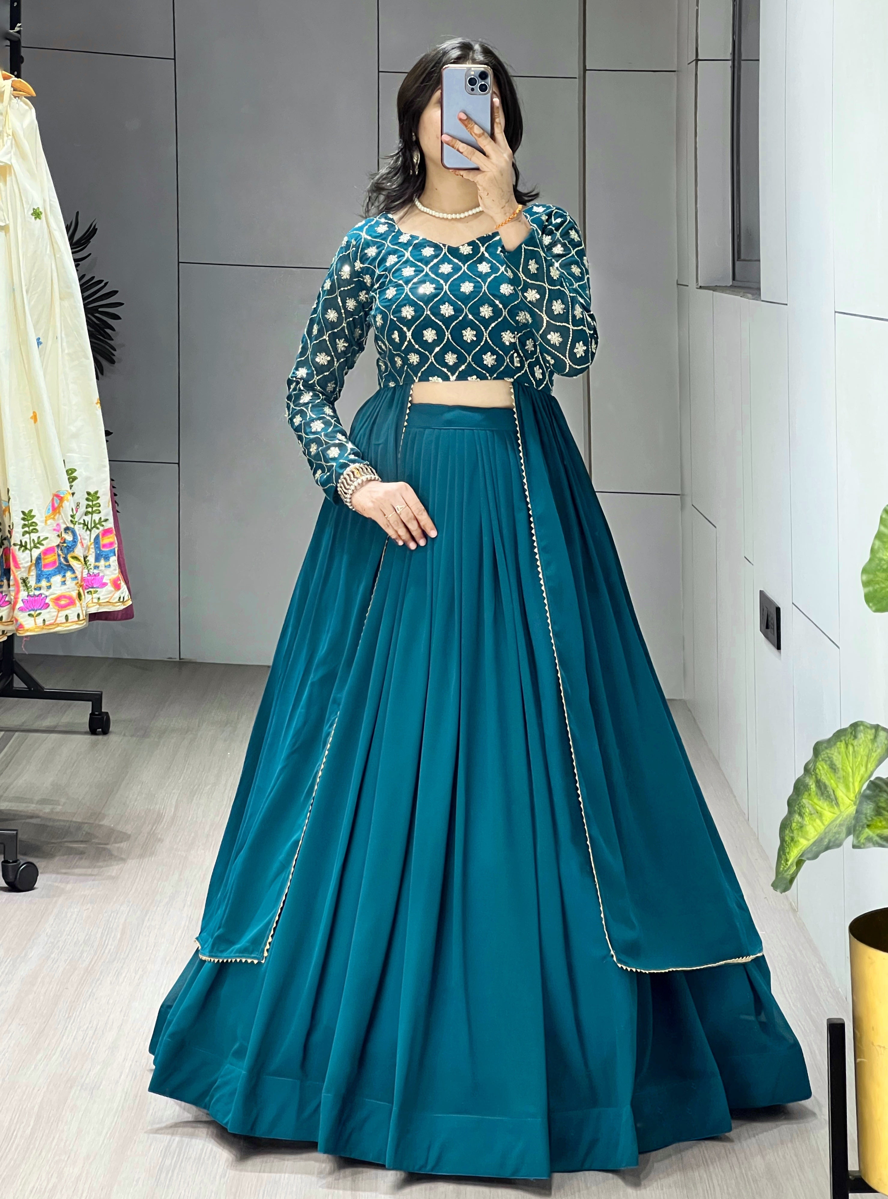 Trending Gorgette Lehenga With Traditional Embroidery Top